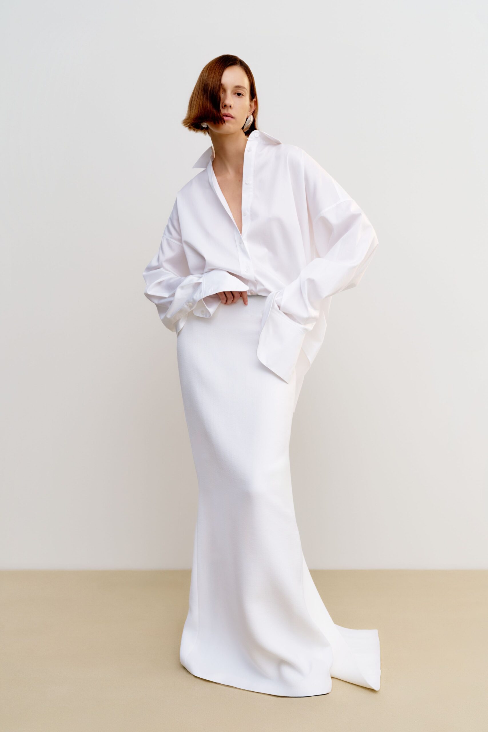 white silk fitted straight-leg flowing maxi skirt