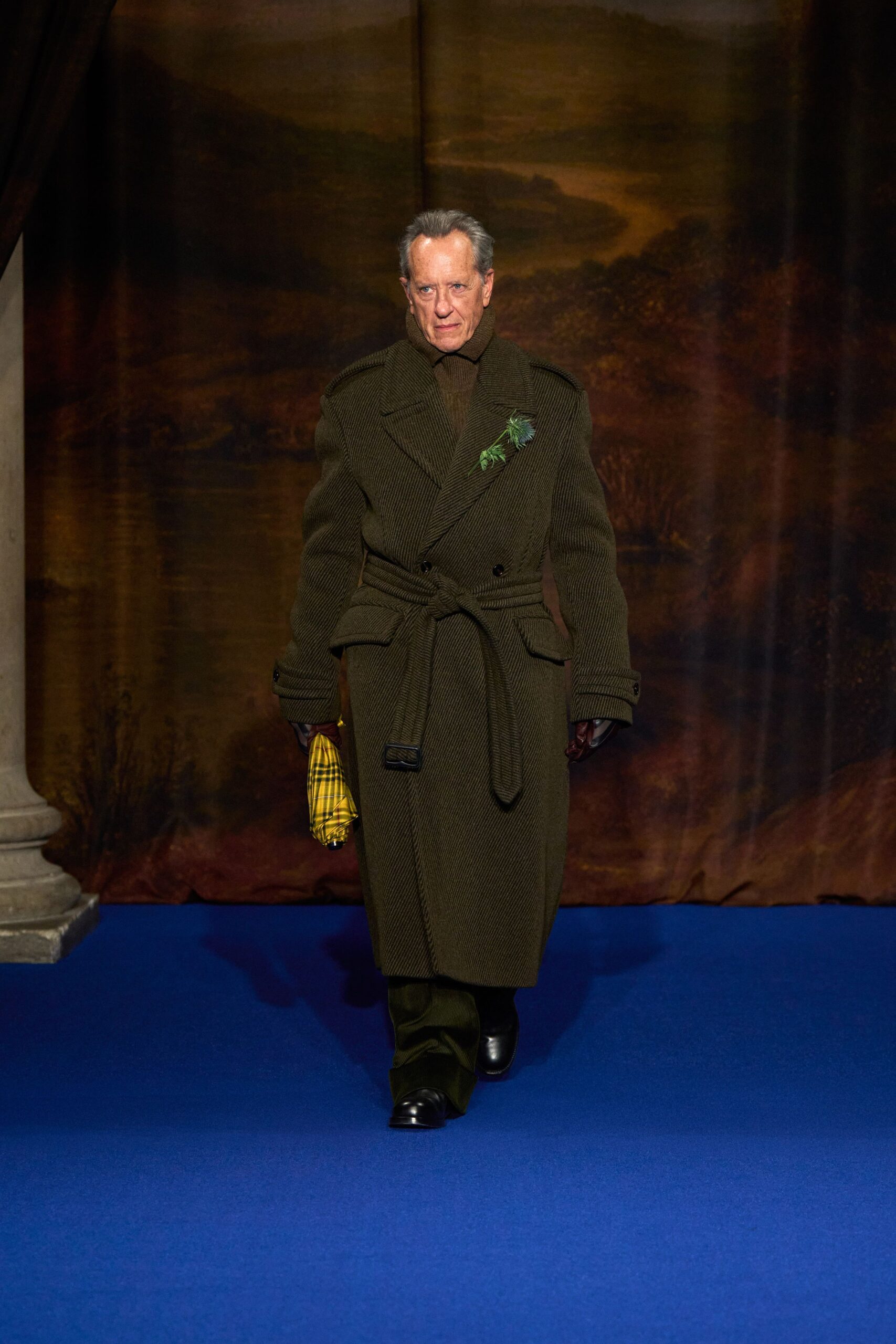 green wool coat with black pants