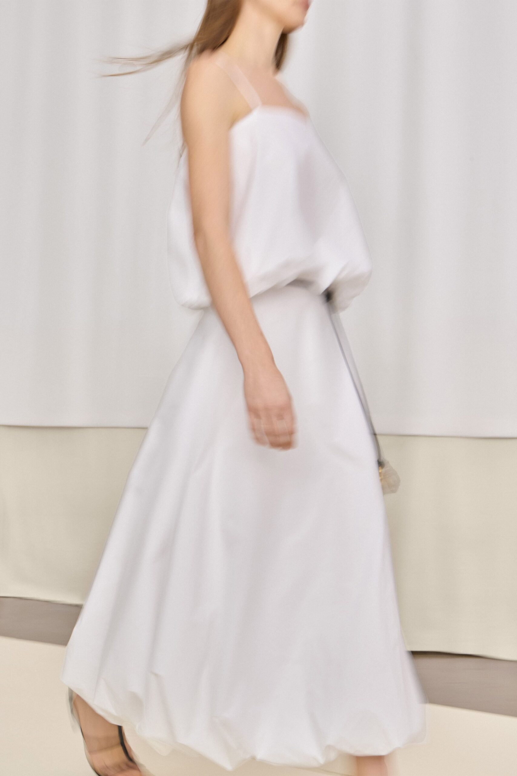 white silk sleeveless dress