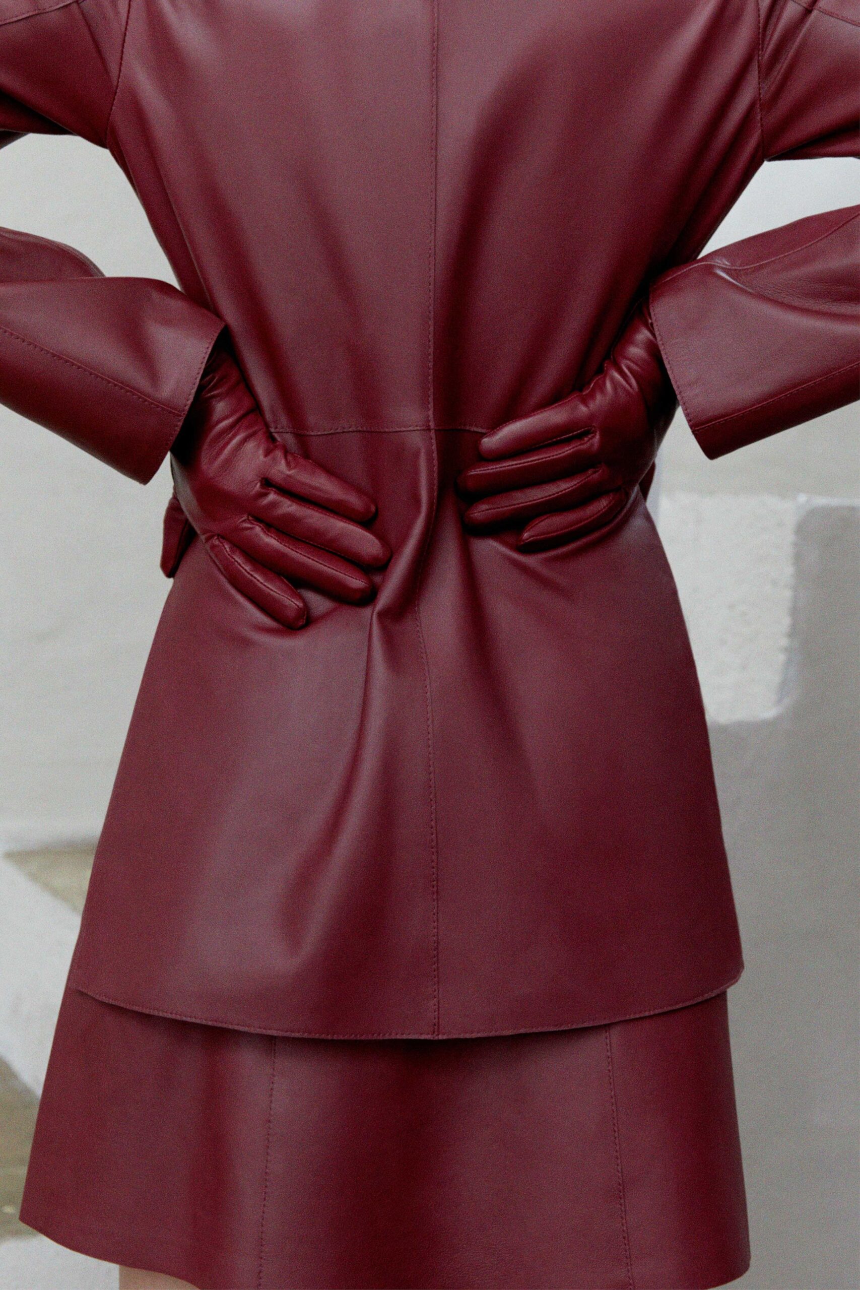 maroon leather structured straight-leg shiny mini skirt