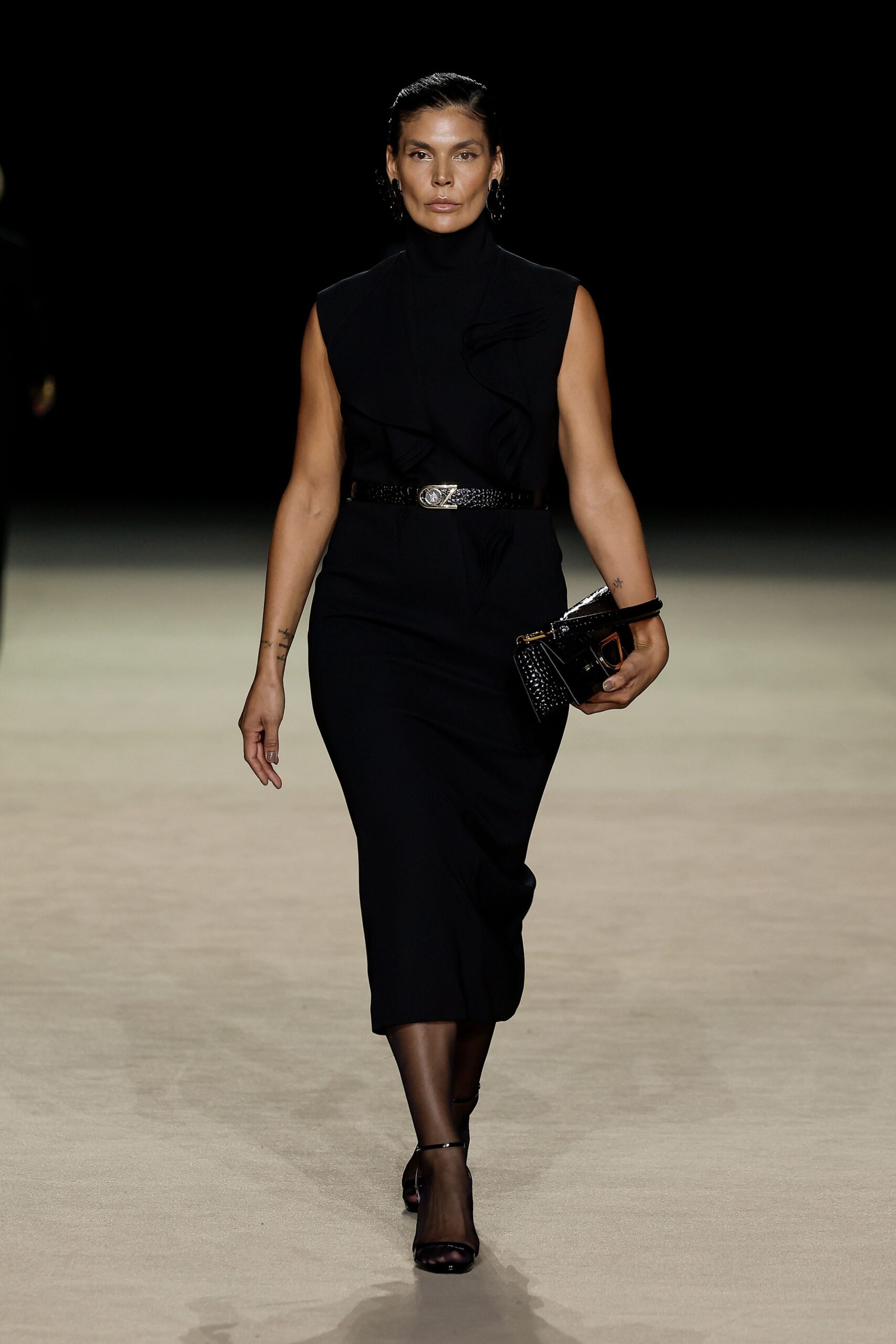 black fitted midi dress with accessories