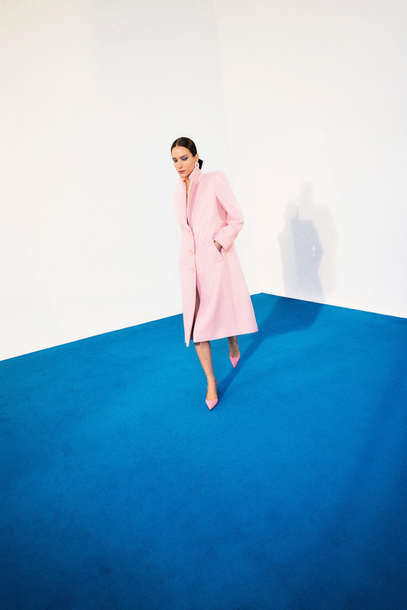 pink long-sleeve collared tailored buttoned coat