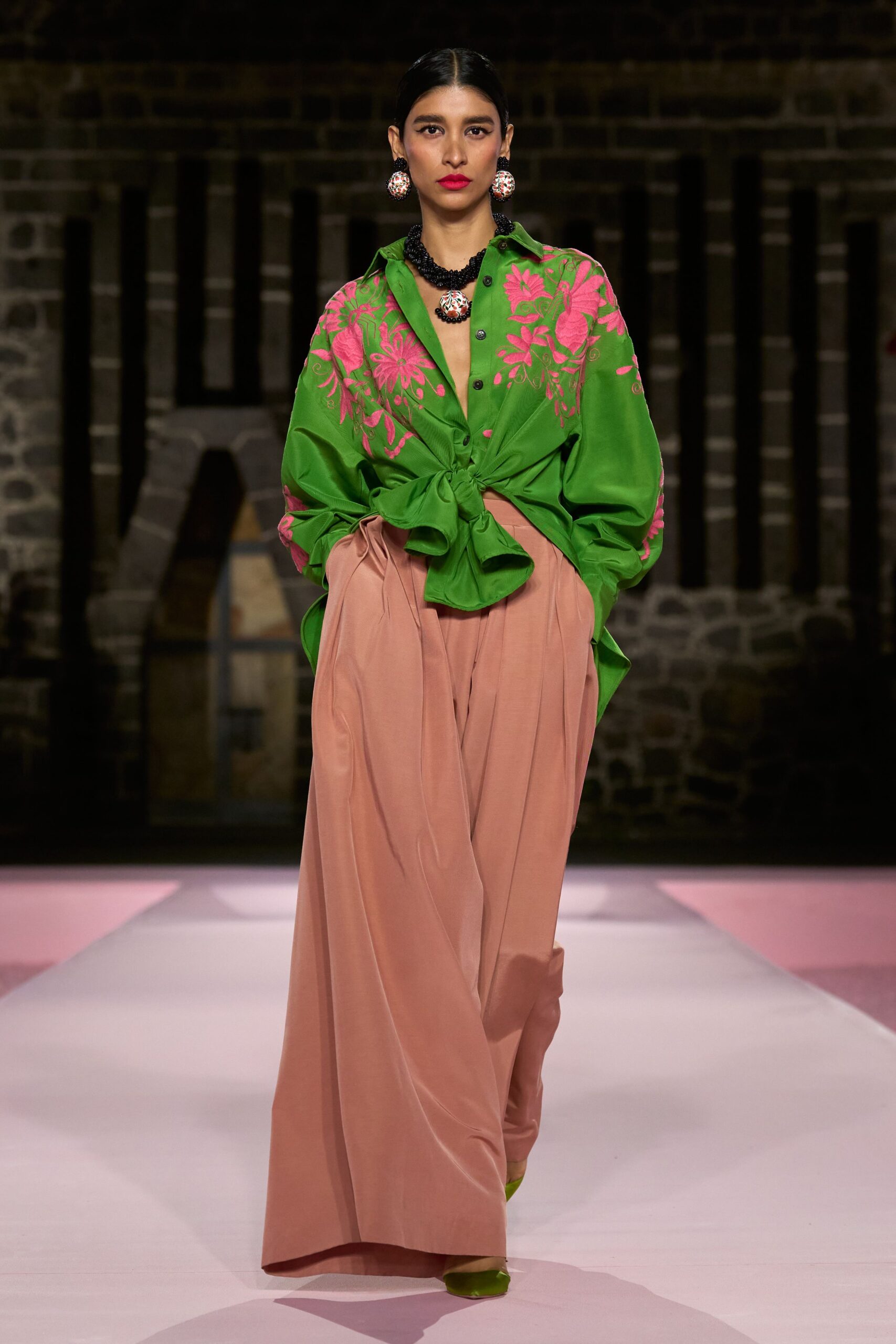 green embroidered shirt with pink pants