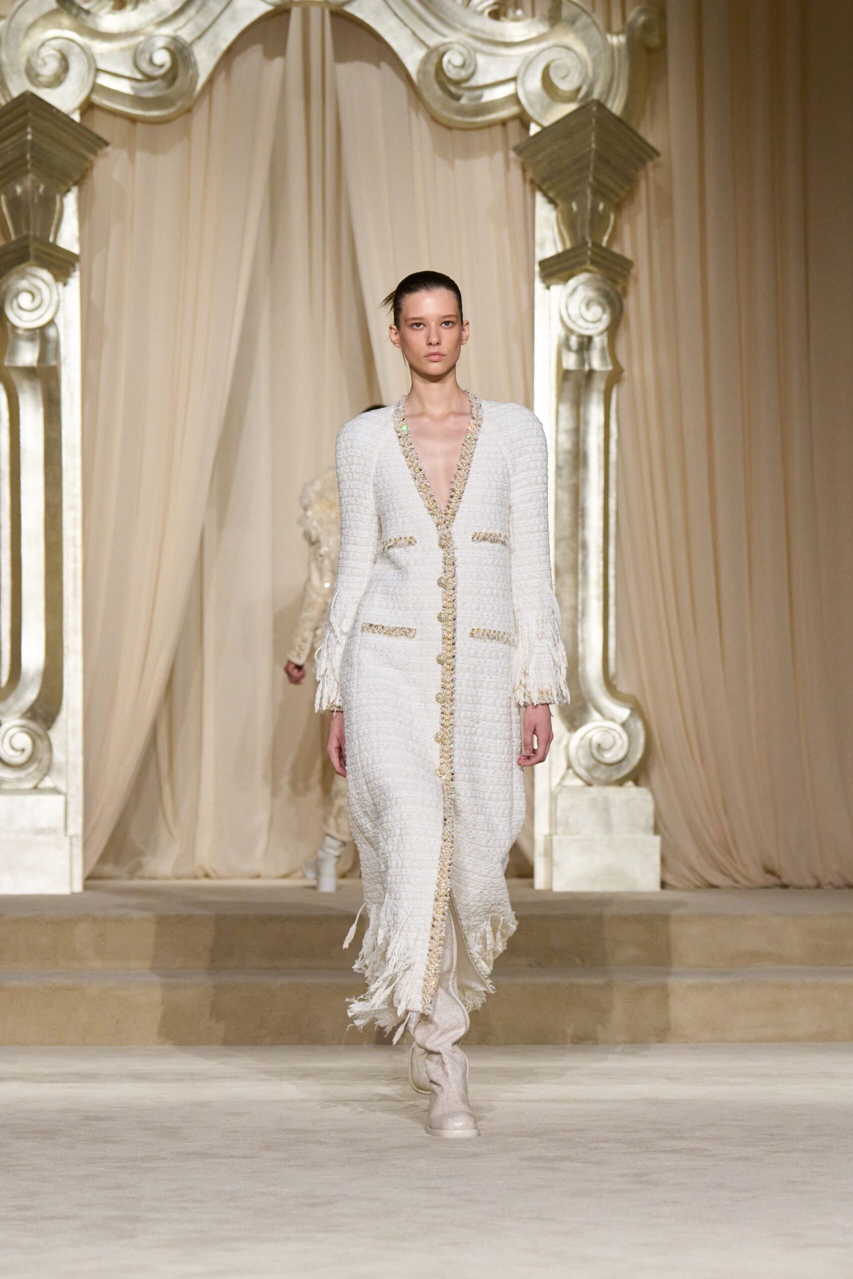 white relaxed coat with fringes