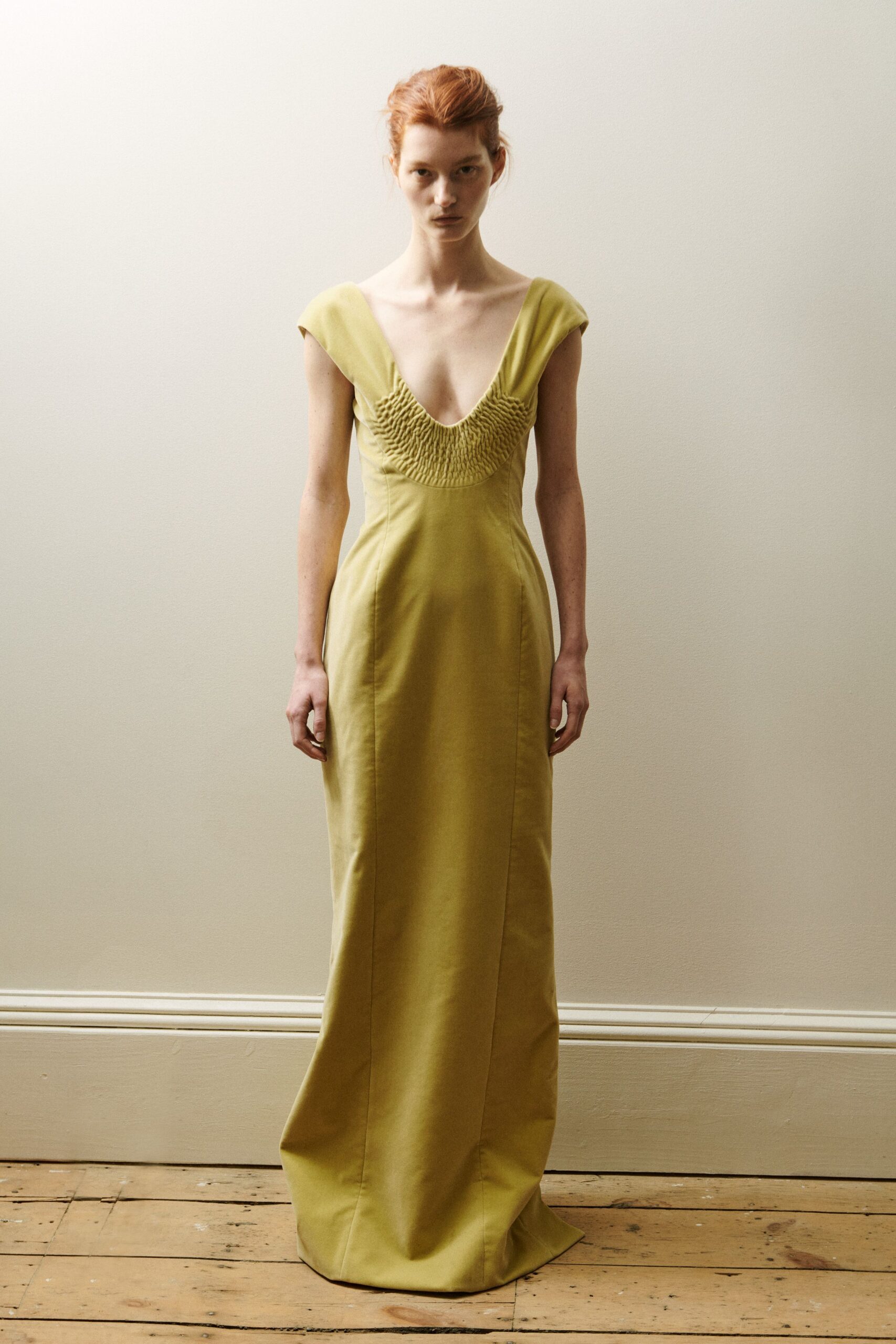 fitted green sleeveless gown