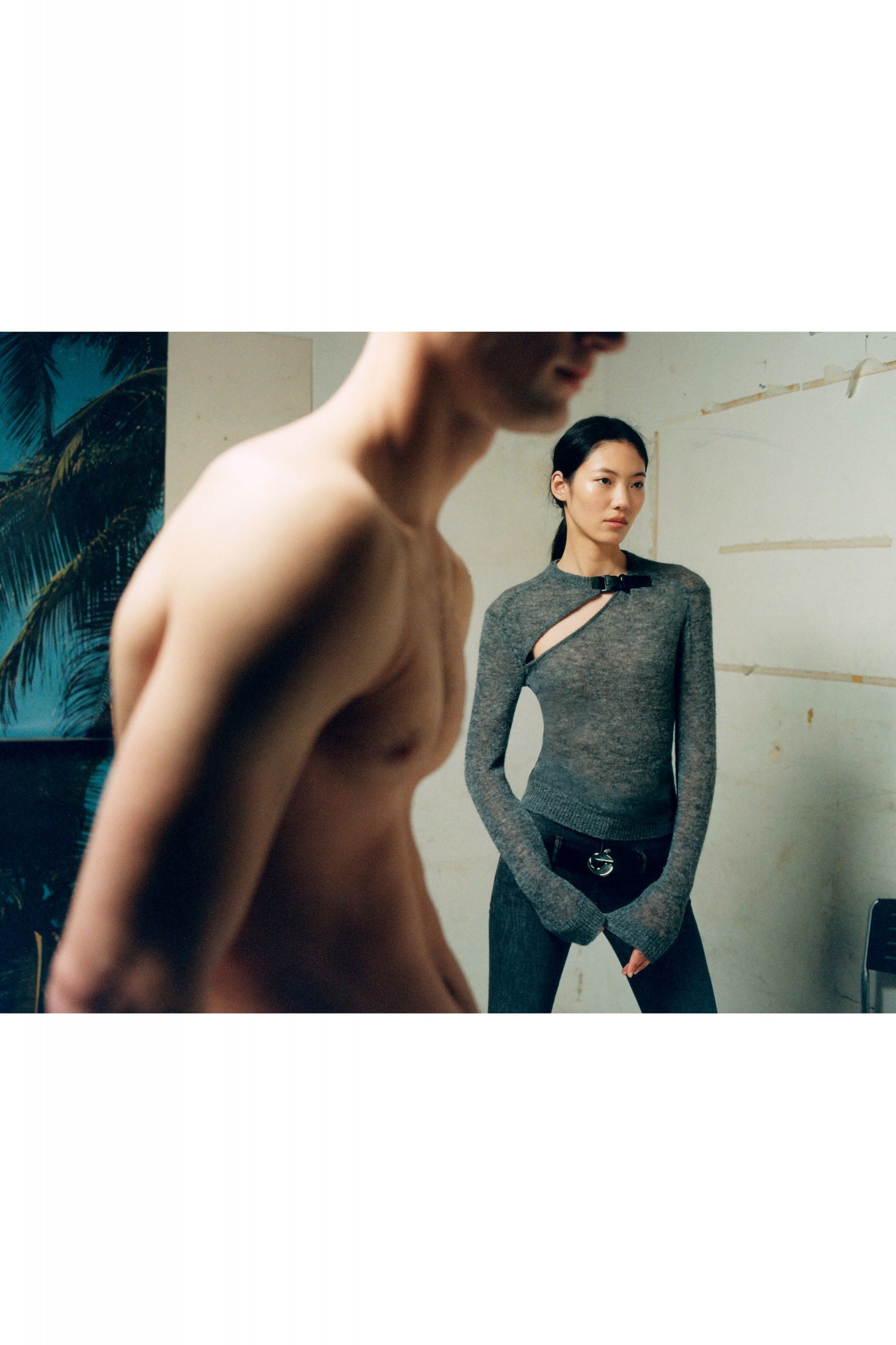 fitted gray top and black pants