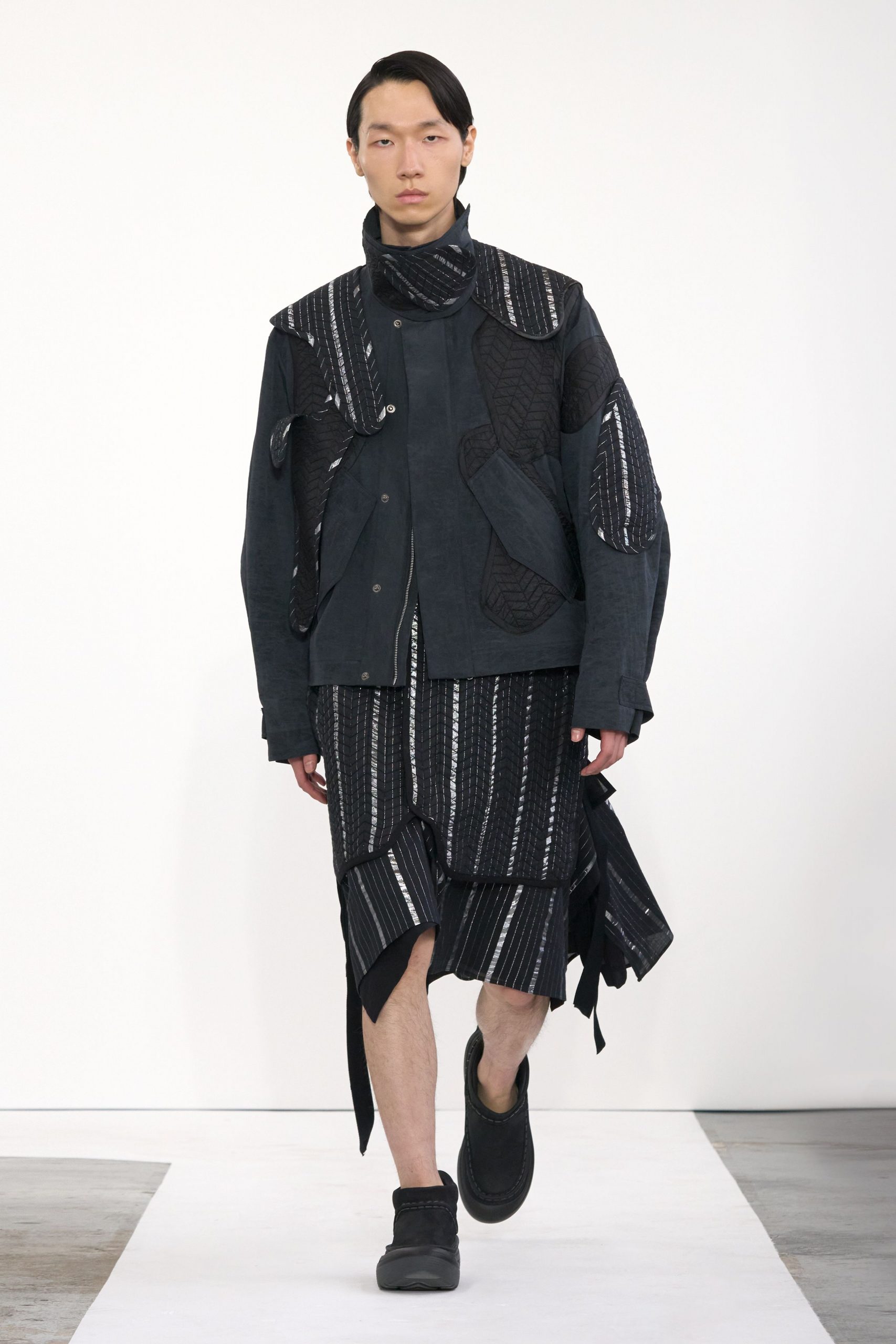 black cotton asymmetric relaxed pleated skirt