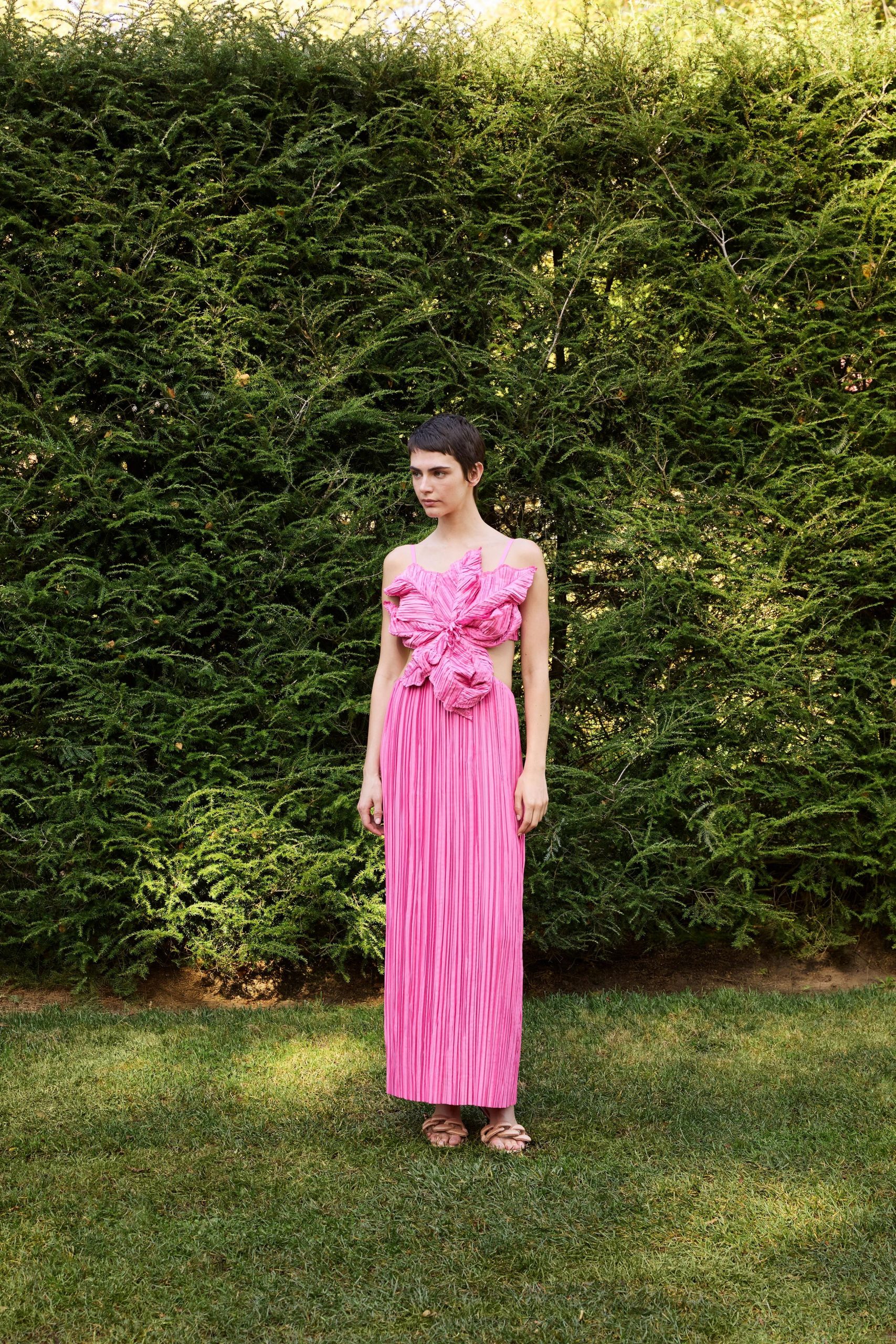pink pleated maxi gown with sandals