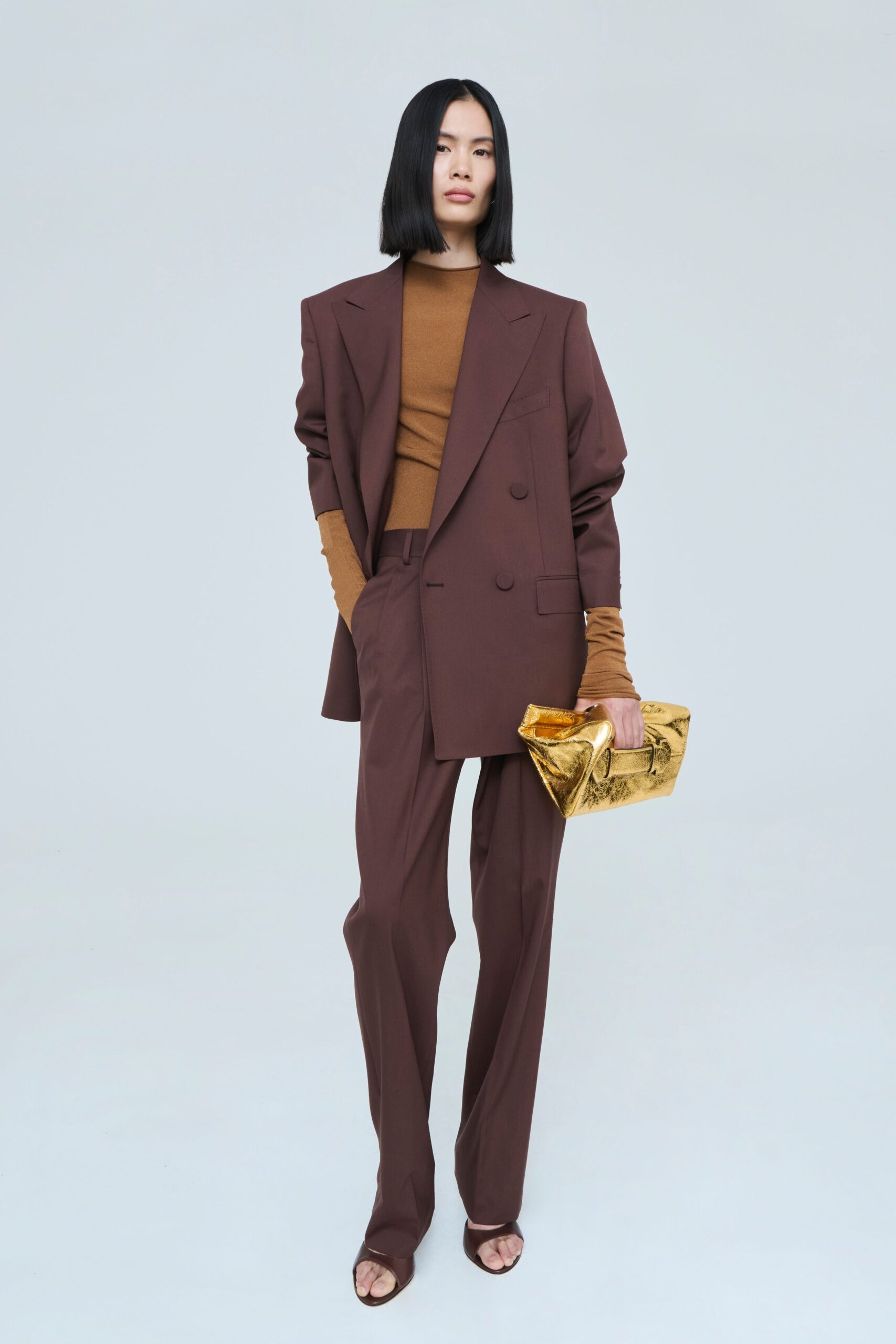 brown oversized blazer with clutch