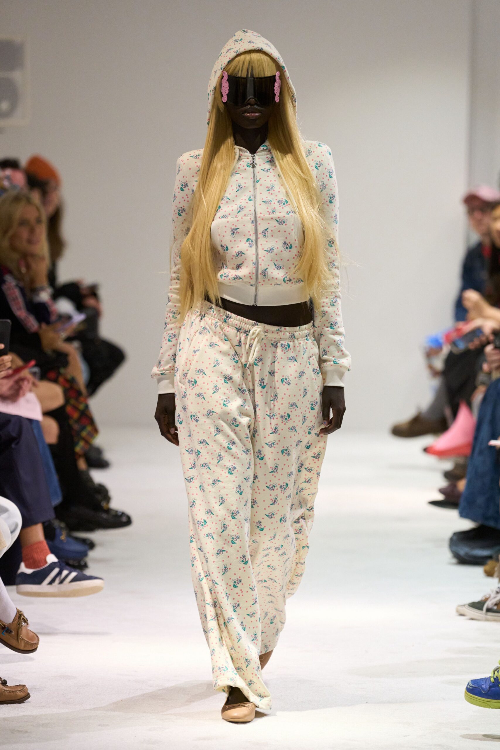 floral hooded jumpsuit with beige shoes