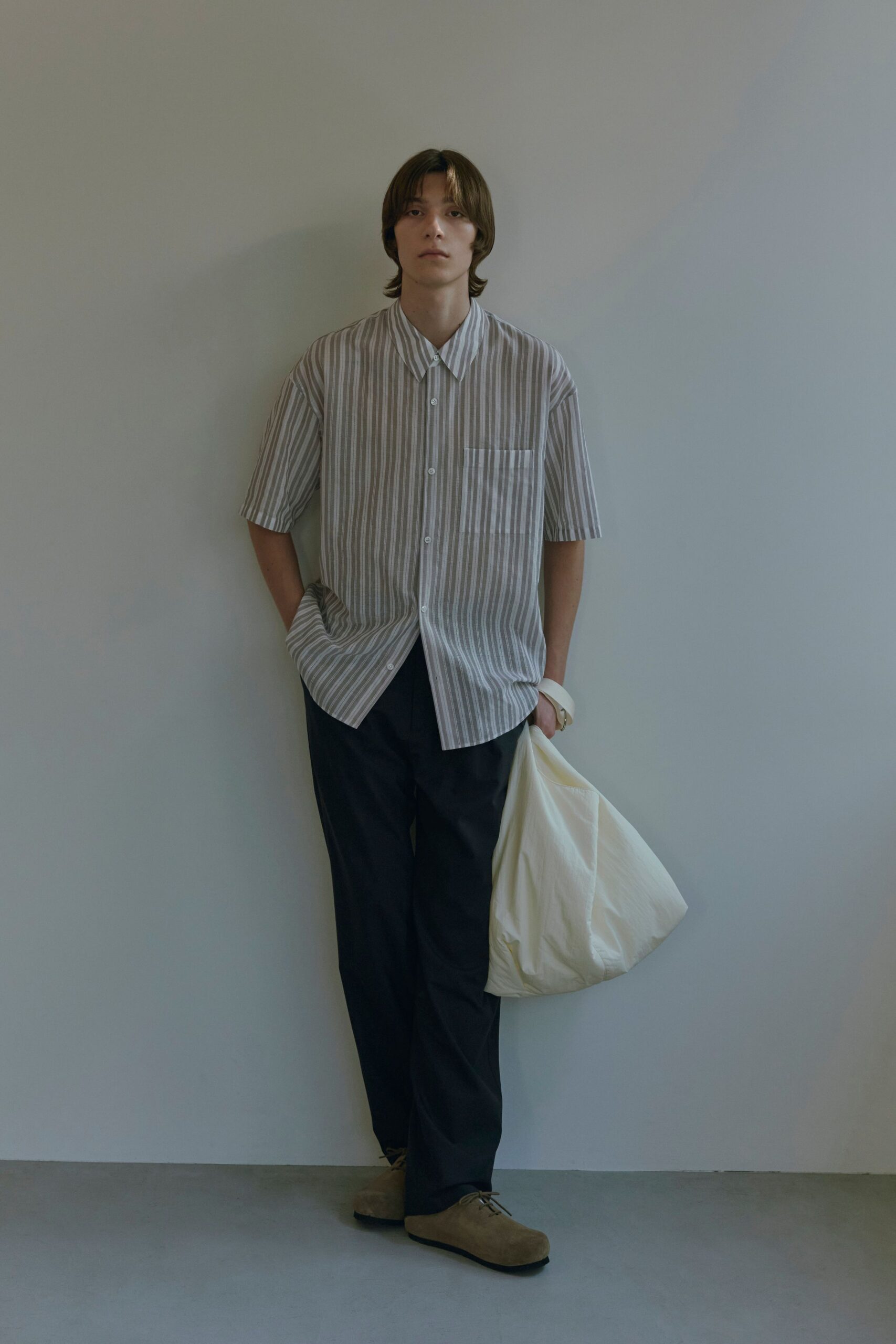relaxed striped shirt and black pants