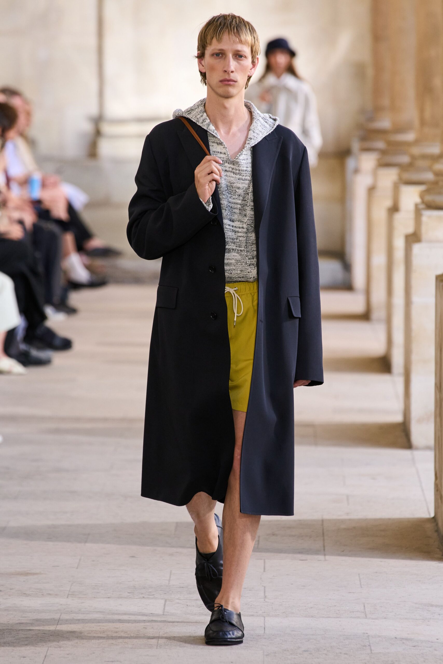 black wool long-sleeve collared oversized buttoned pockets coat