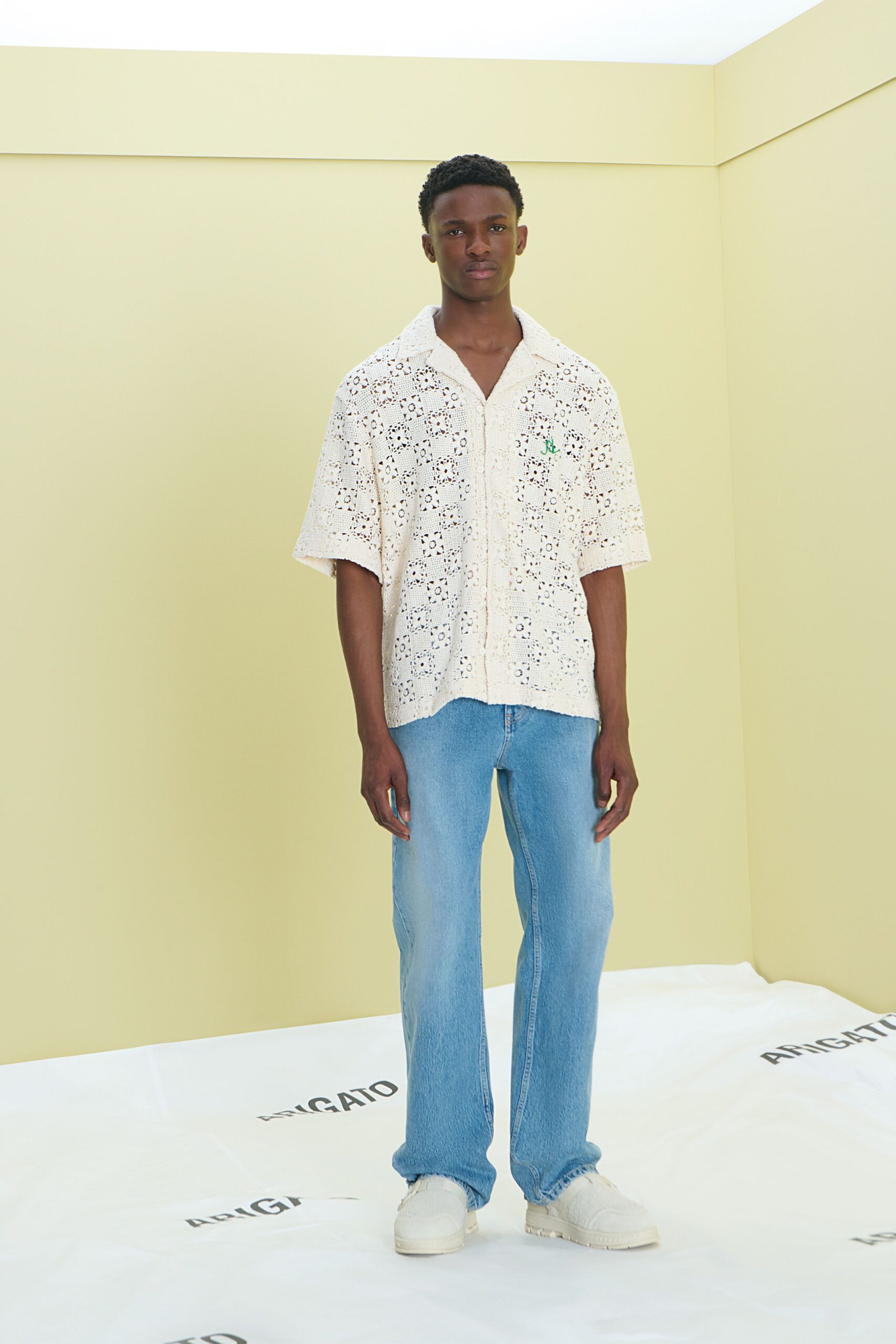 white embroidered shirt blue jeans