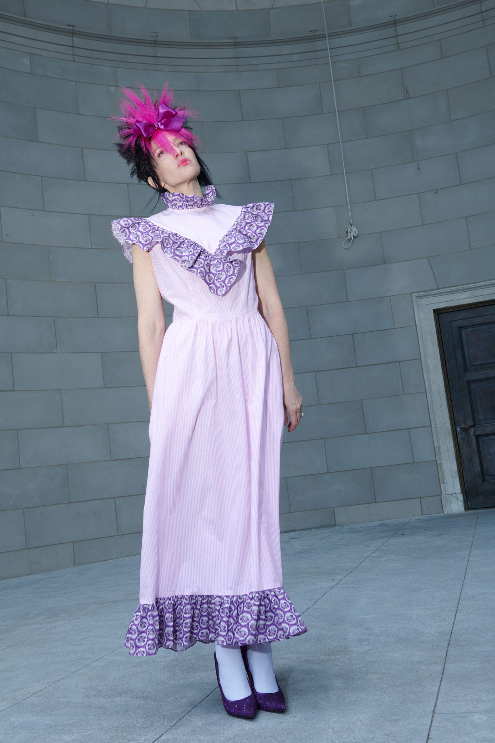 pink cotton sleeveless high-neck relaxed ruffled printed dress