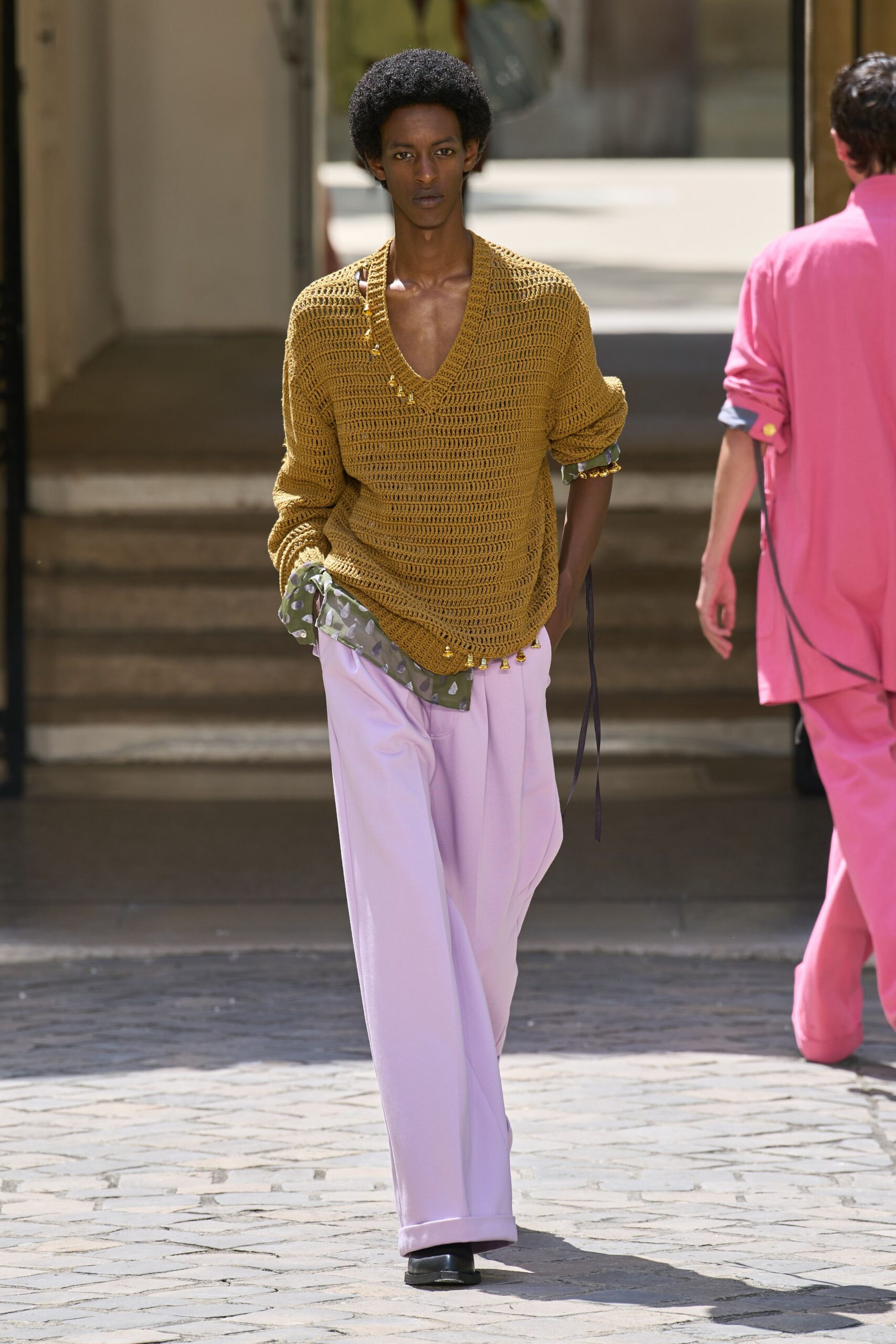 yellow relaxed sweater with purple pants