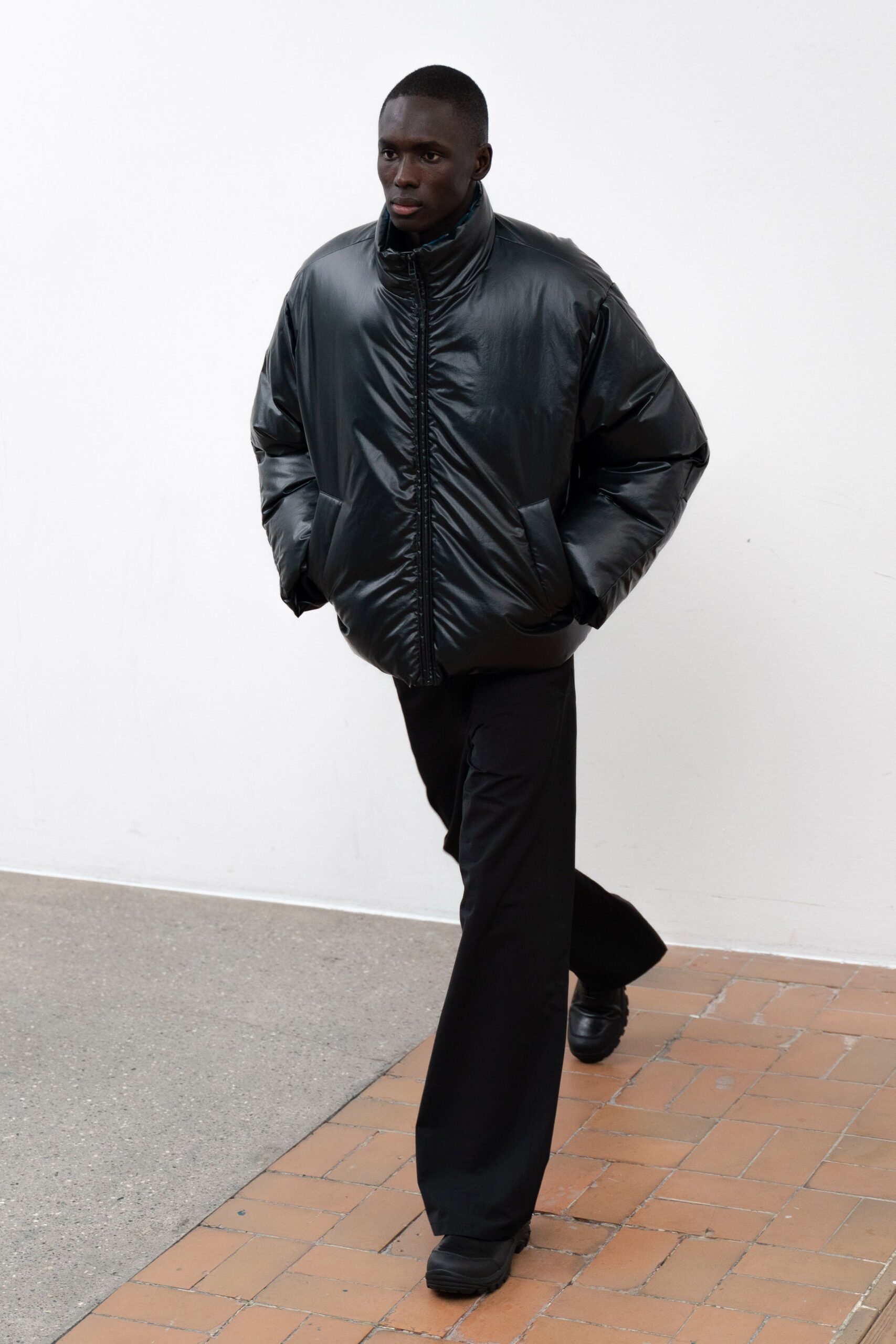 black vinyl long-sleeve collared oversized shiny jacket
