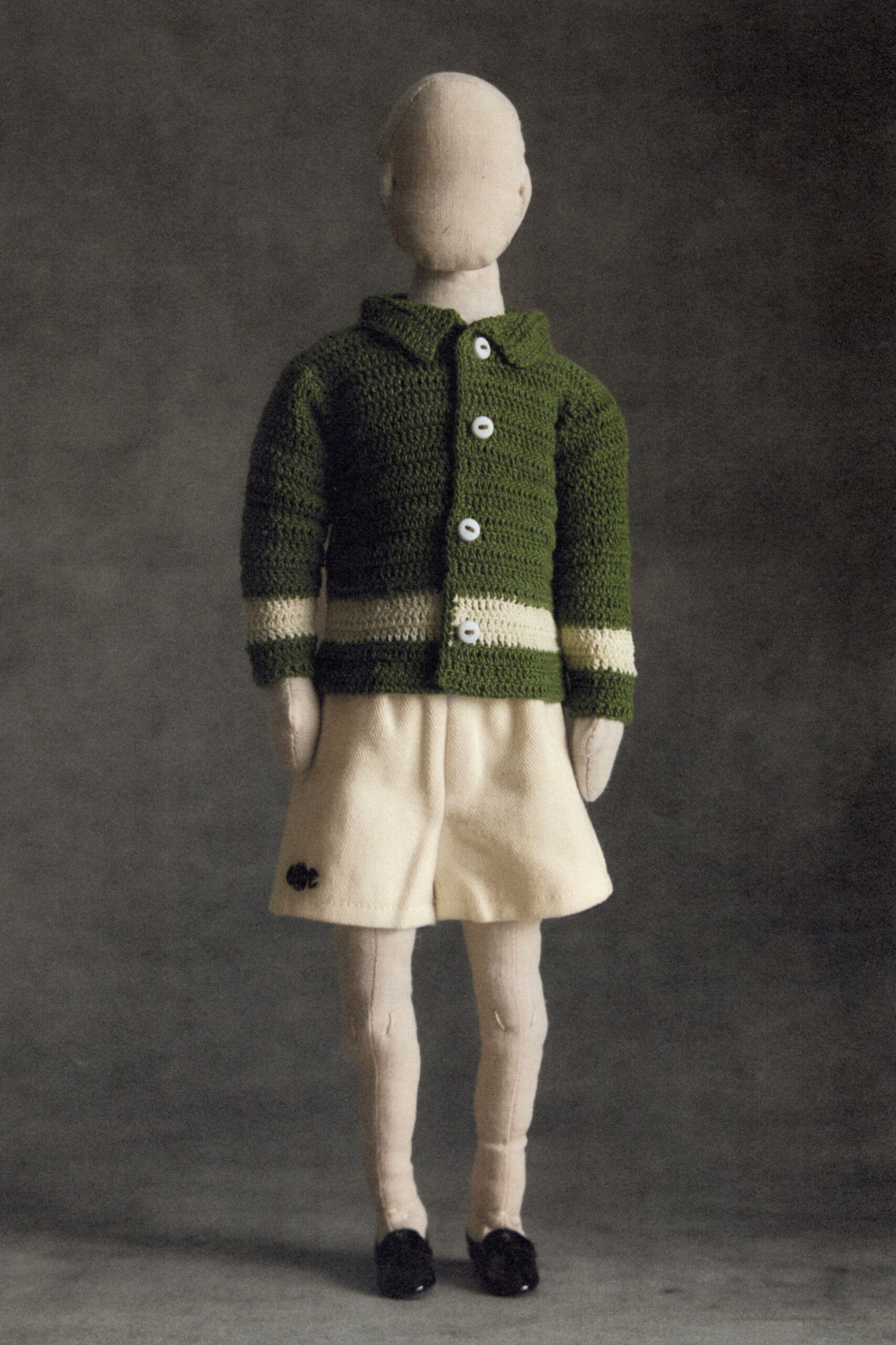 green knit long-sleeve collared structured buttoned striped jacket