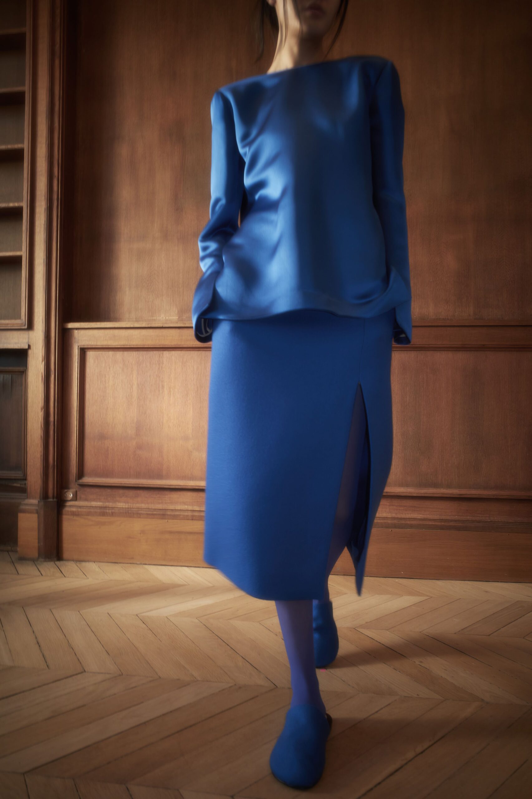 blue neoprene long-sleeve high-neck relaxed top