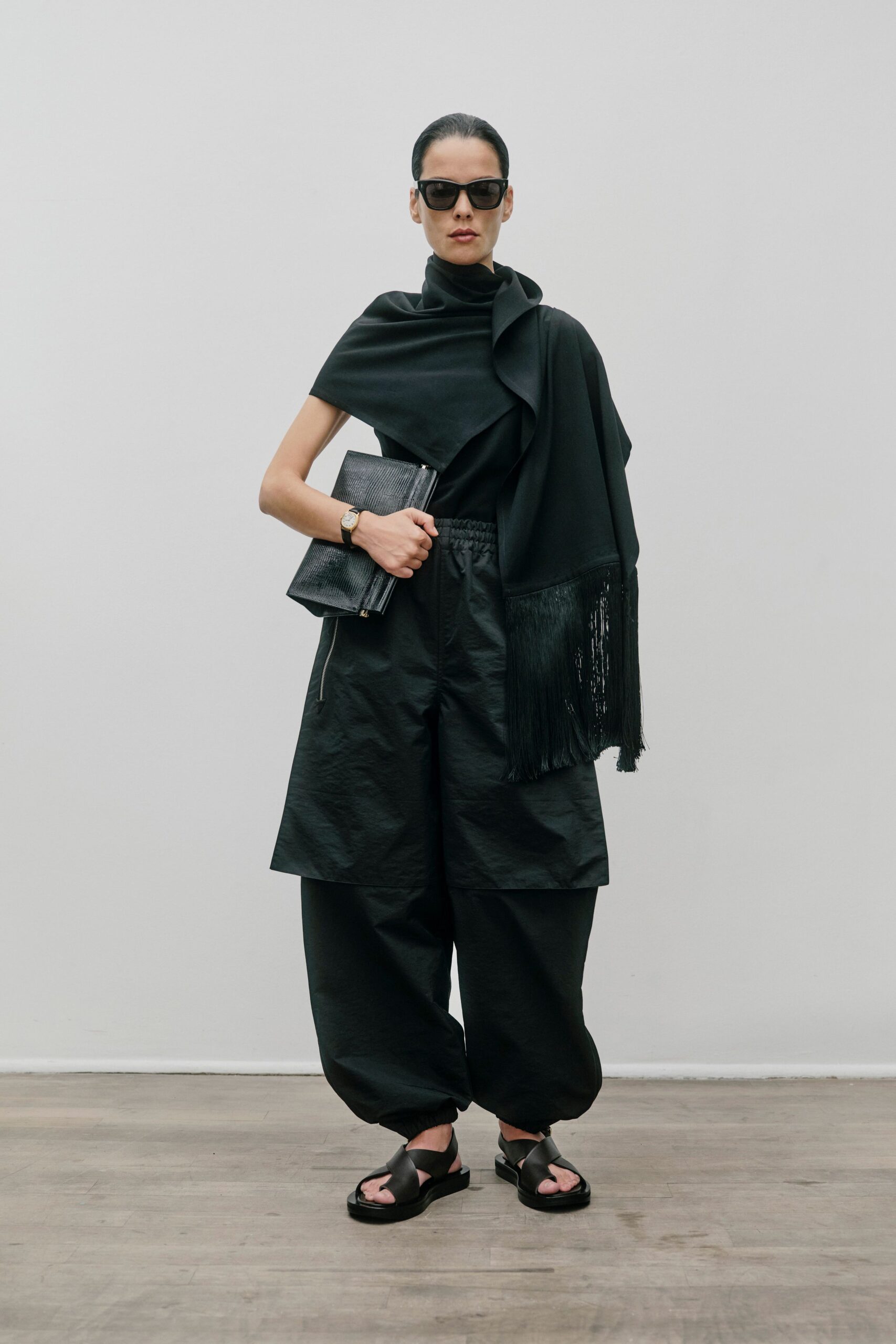 black fitted top and relaxed pants