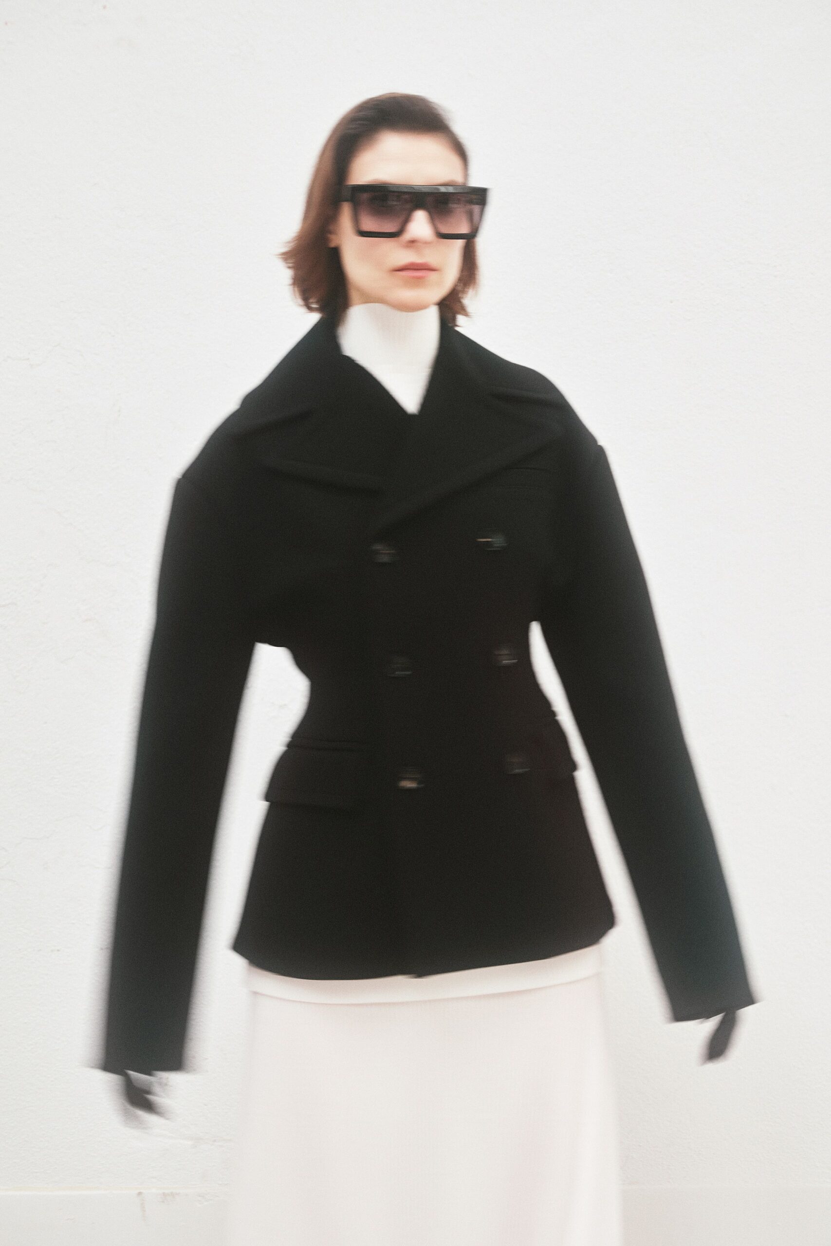 black wool long-sleeve collared structured buttoned jacket