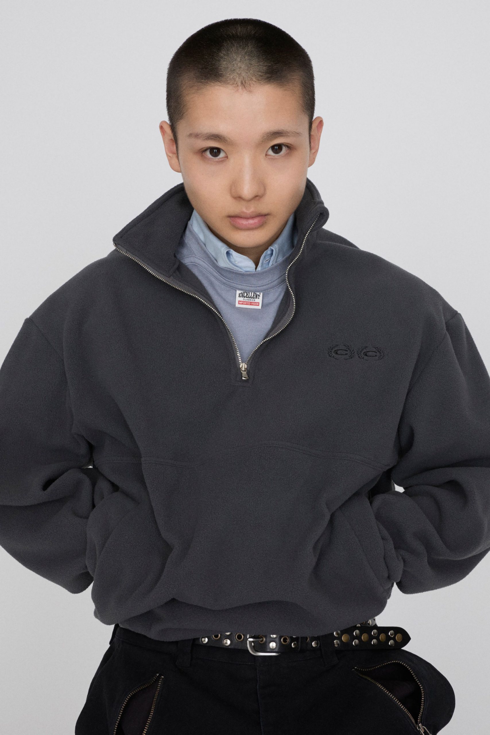gray hoodie with blue shirt