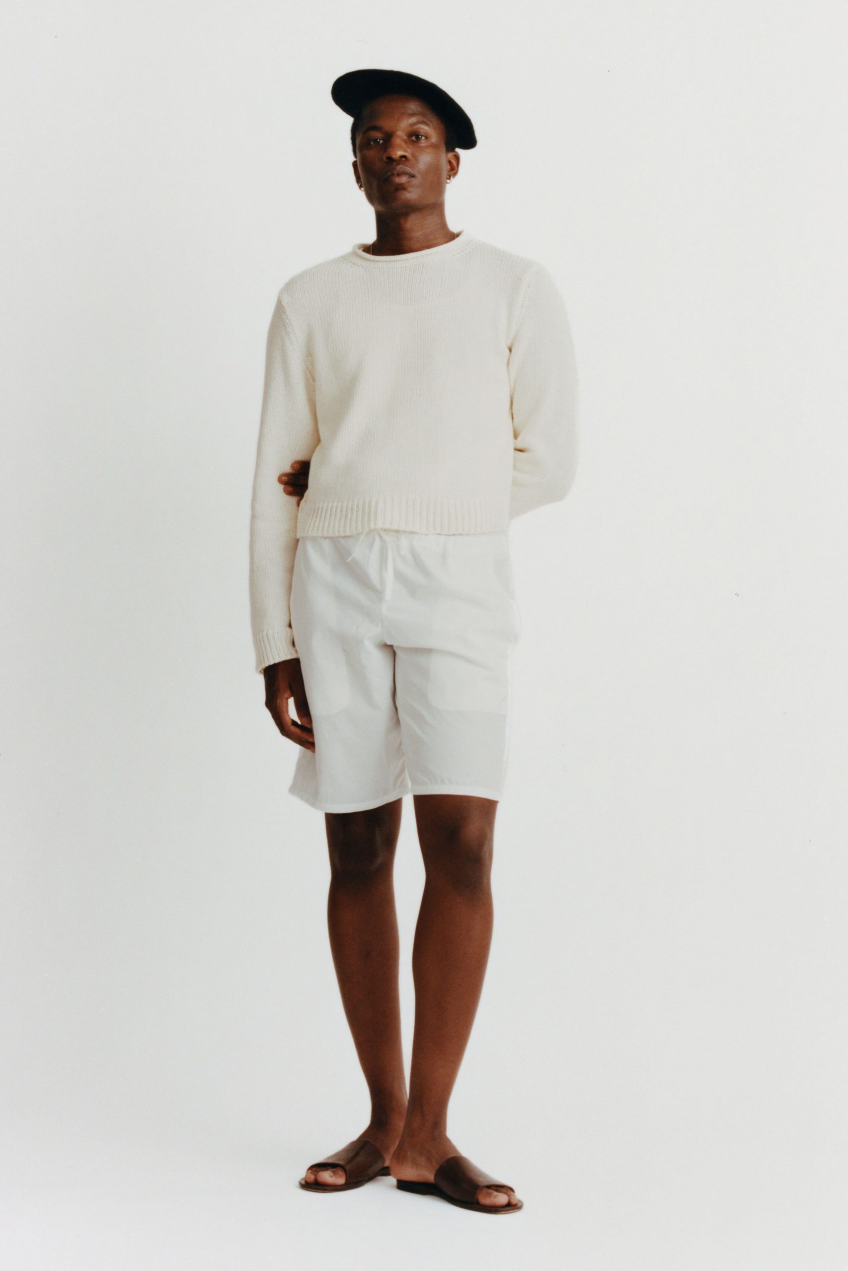 white sweater with shorts
