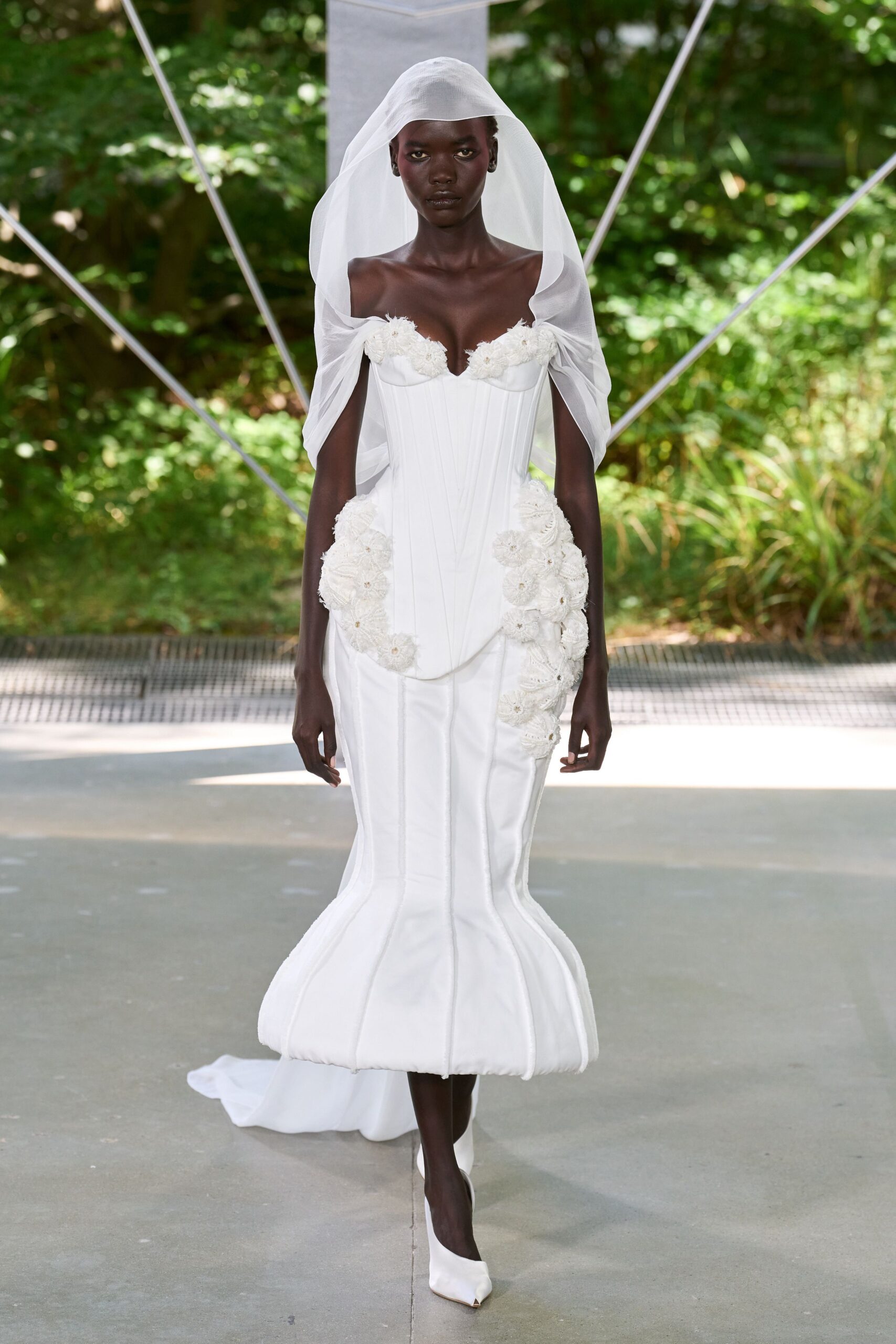 white fitted gown with veil