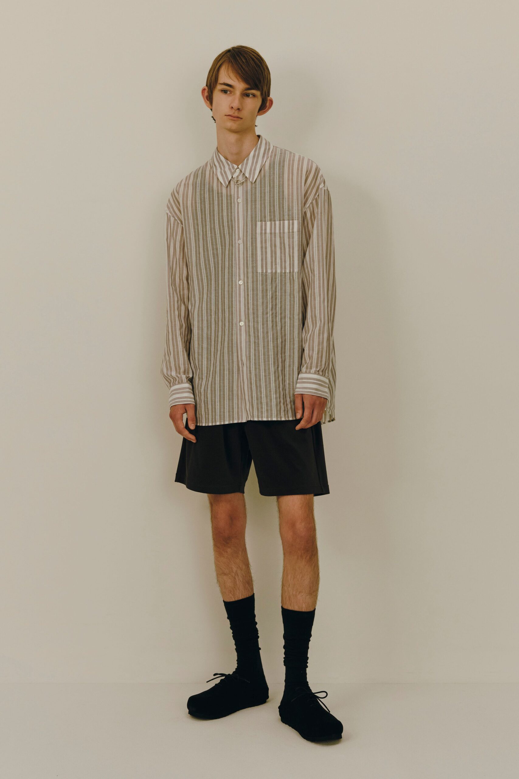 relaxed striped shirt with black shorts
