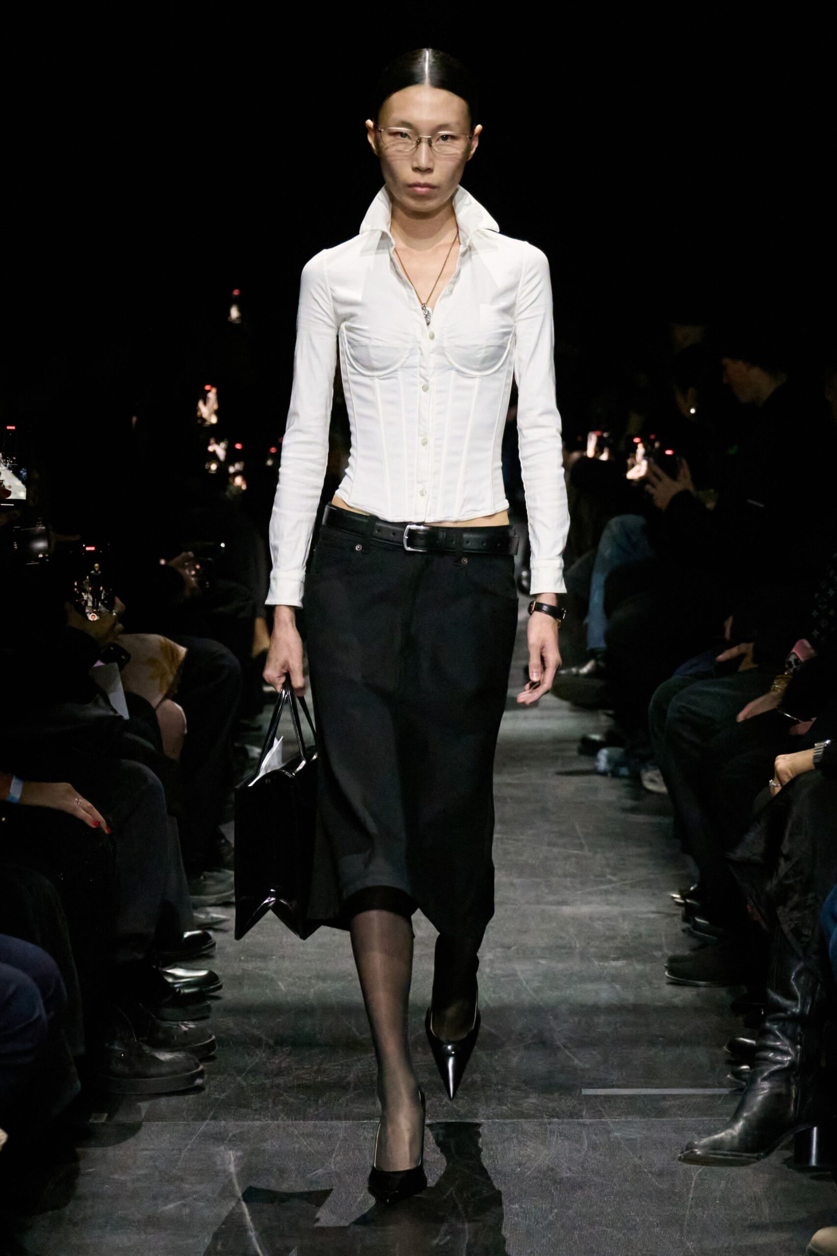 fitted white shirt and black skirt