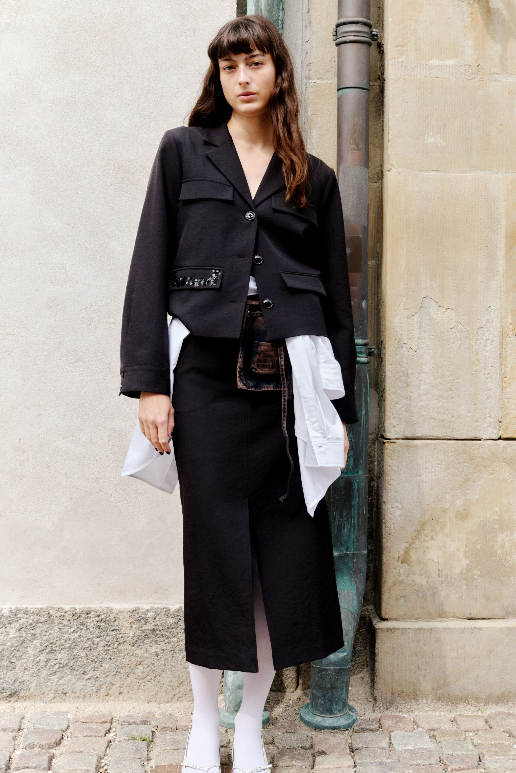 black fitted jacket and skirt