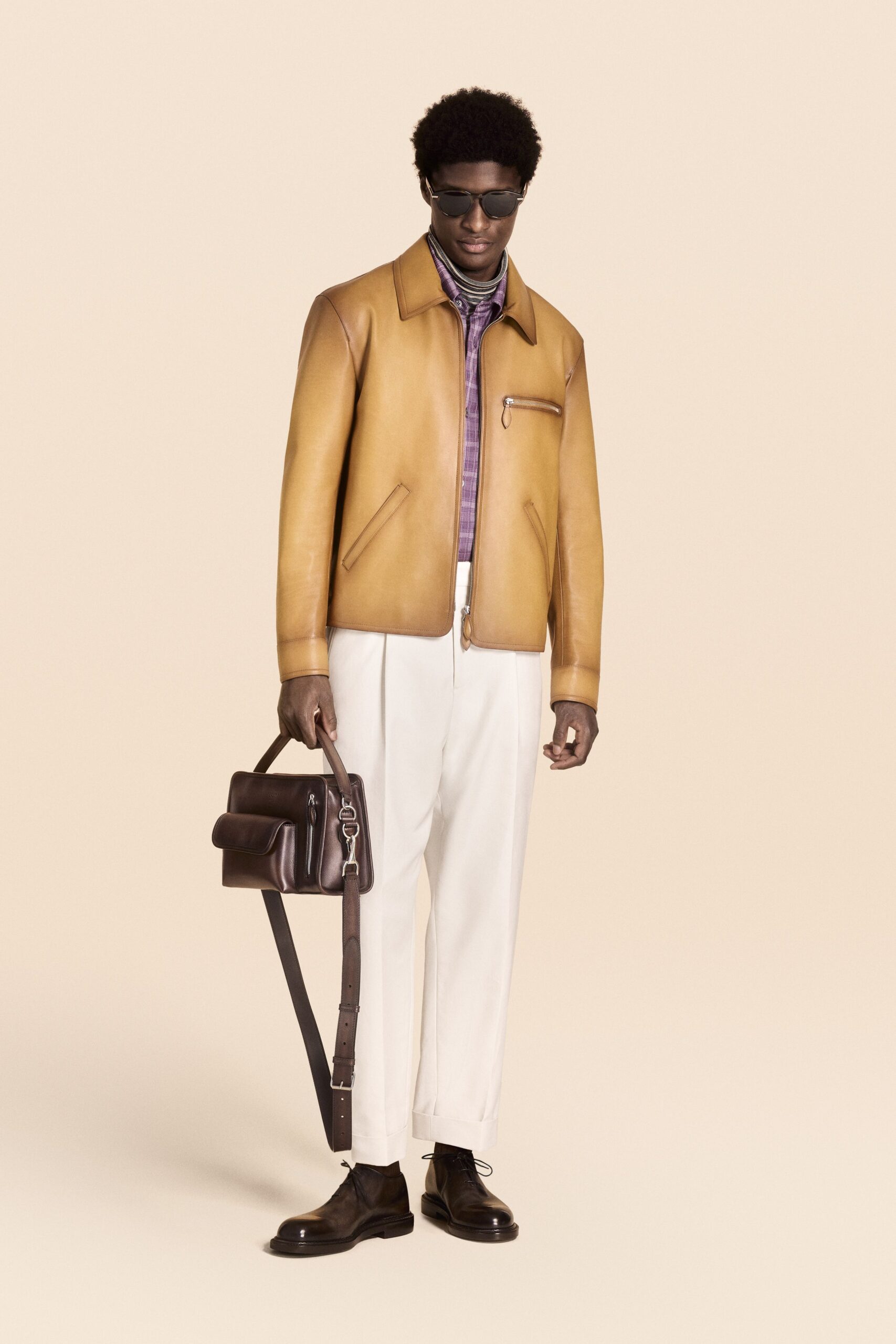 brown leather long-sleeve collared structured zippered pockets jacket