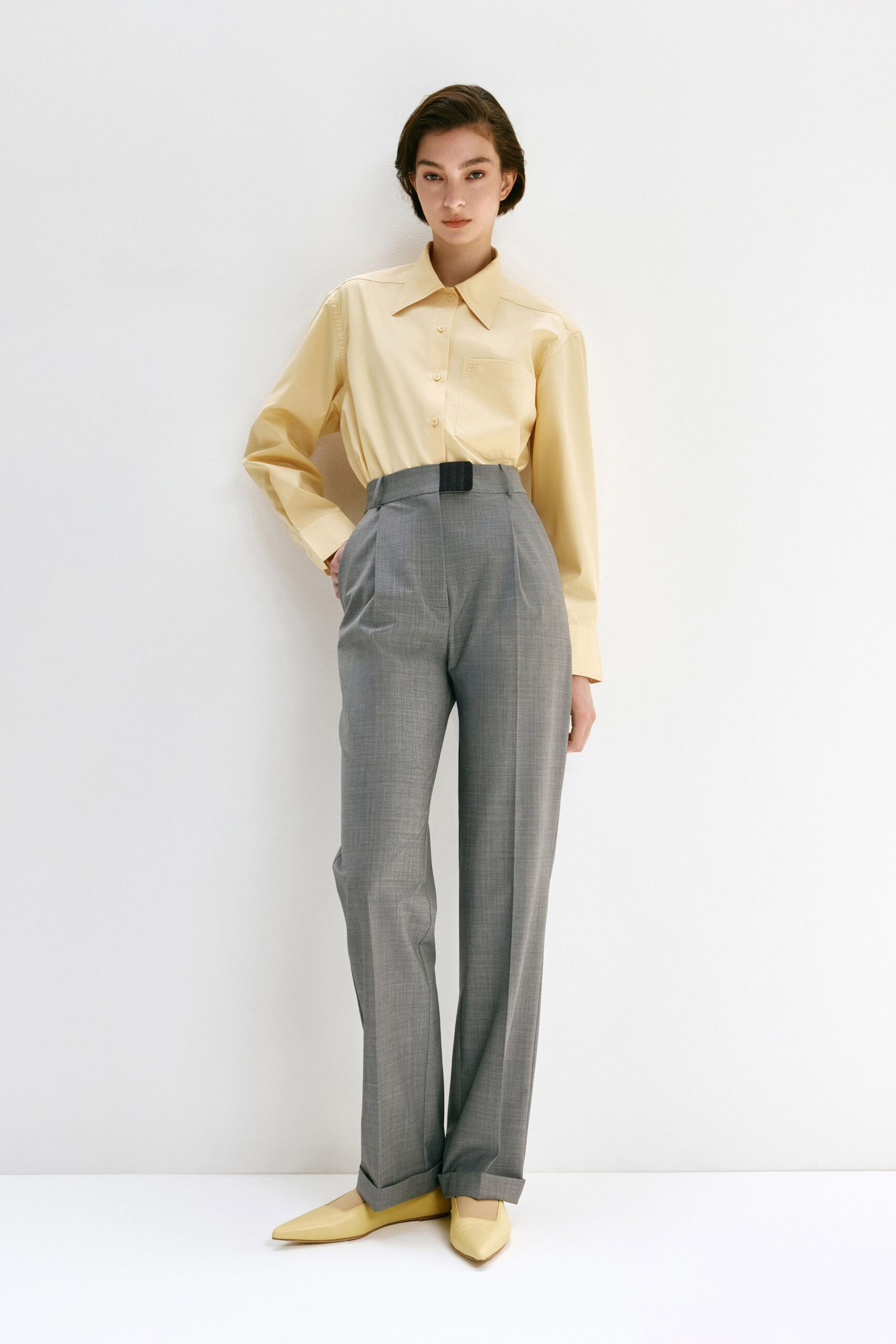 yellow shirt gray tailored pants