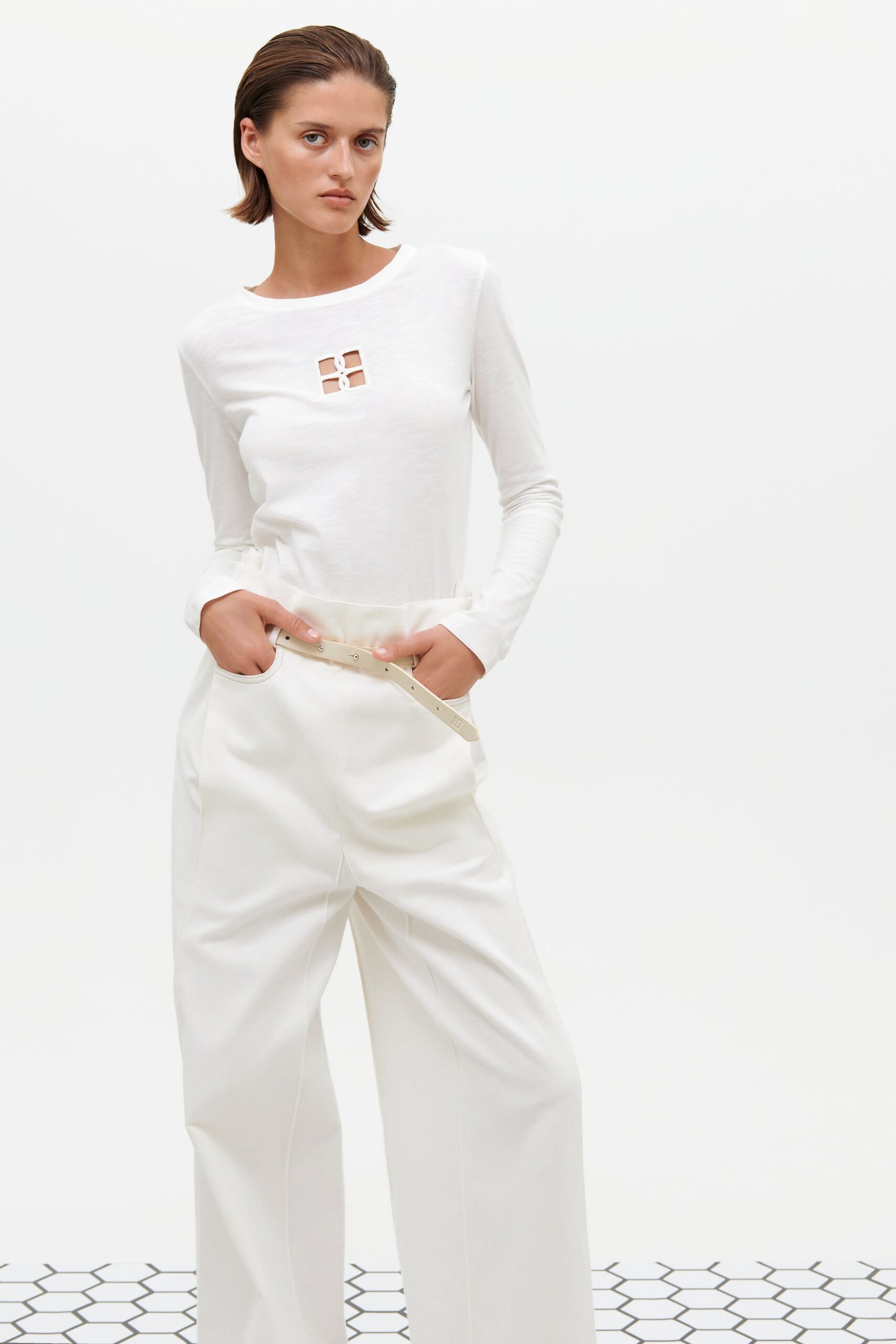 white fitted top and relaxed pants