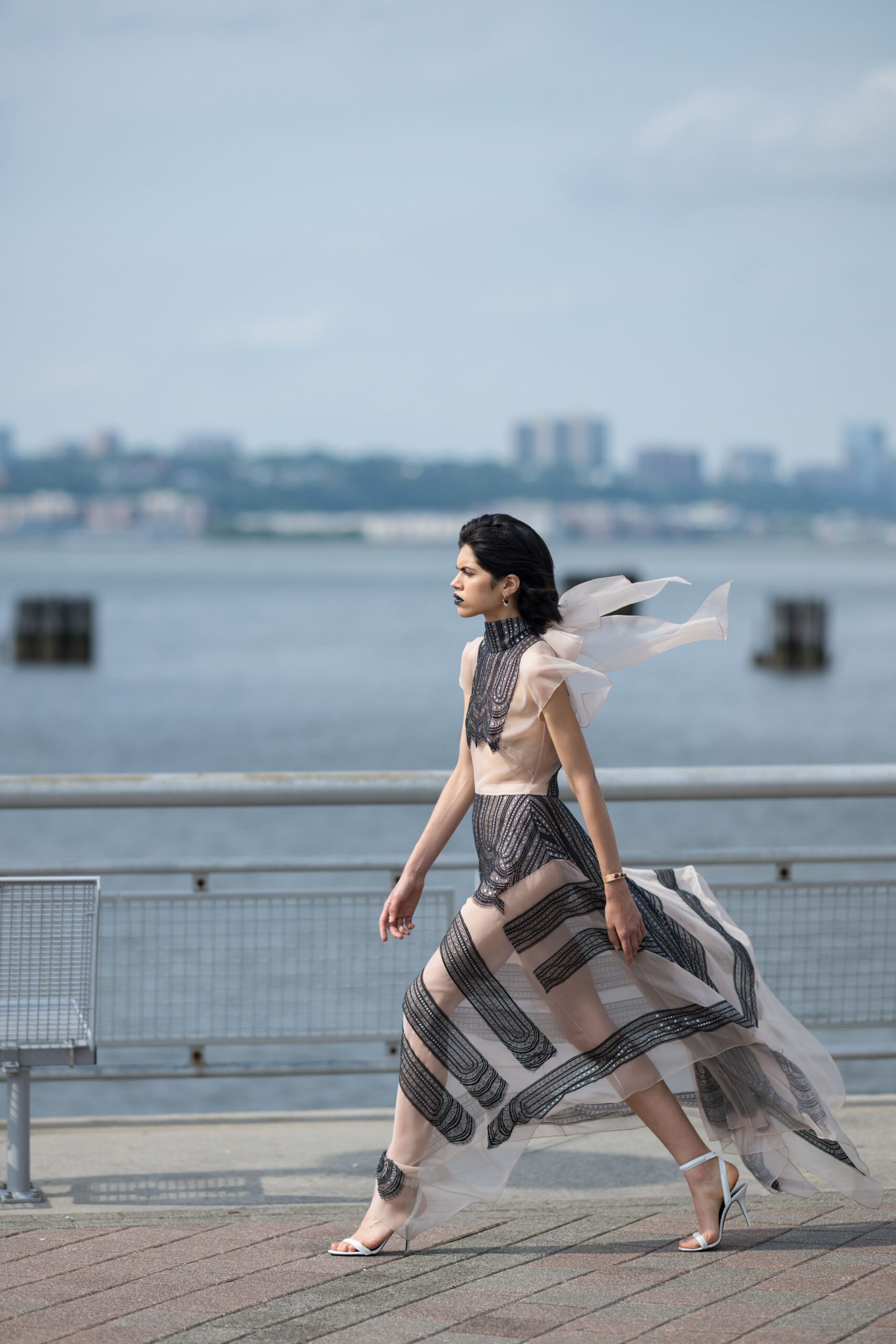 beige silk top black layered skirt