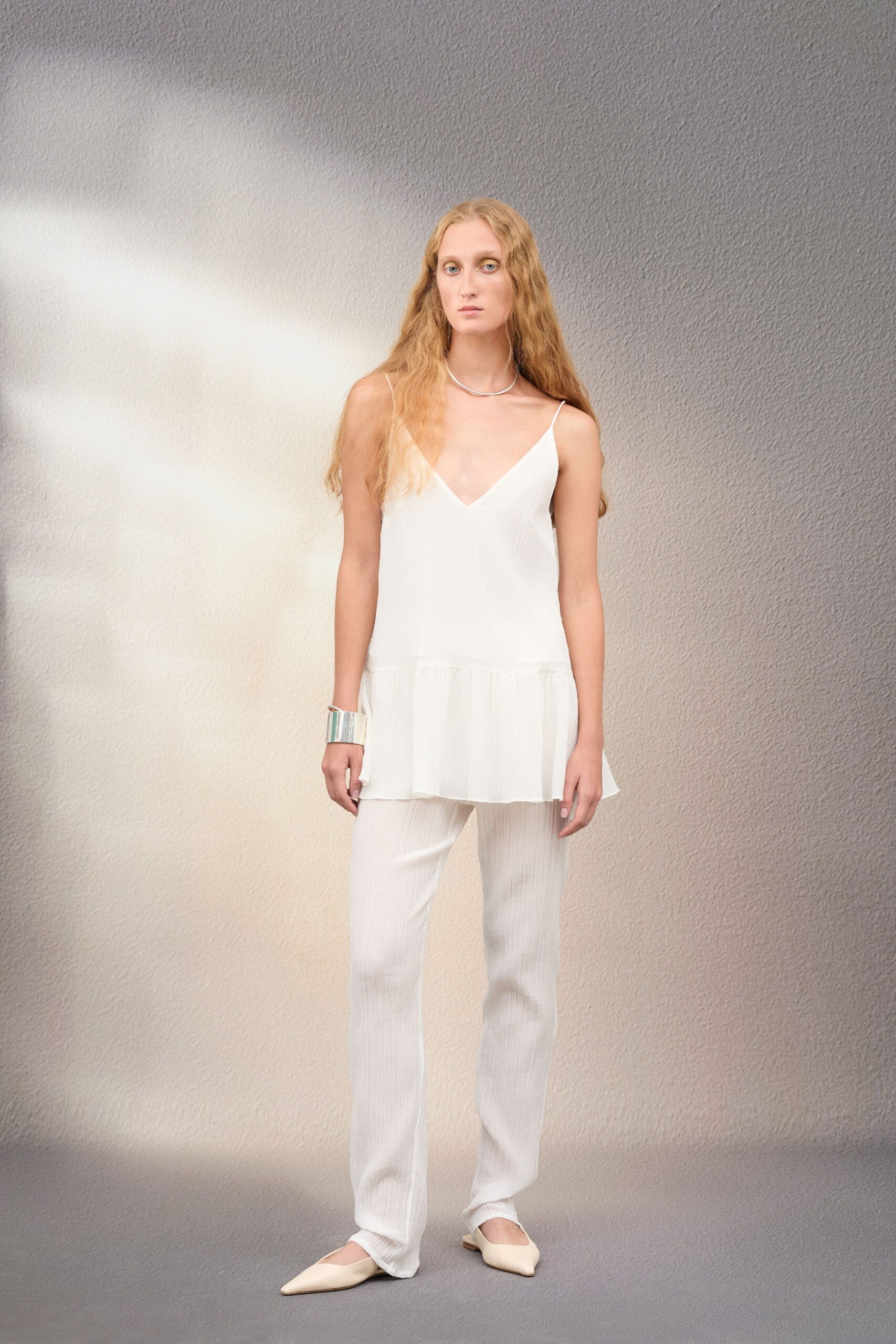 white silk pleated top with pants