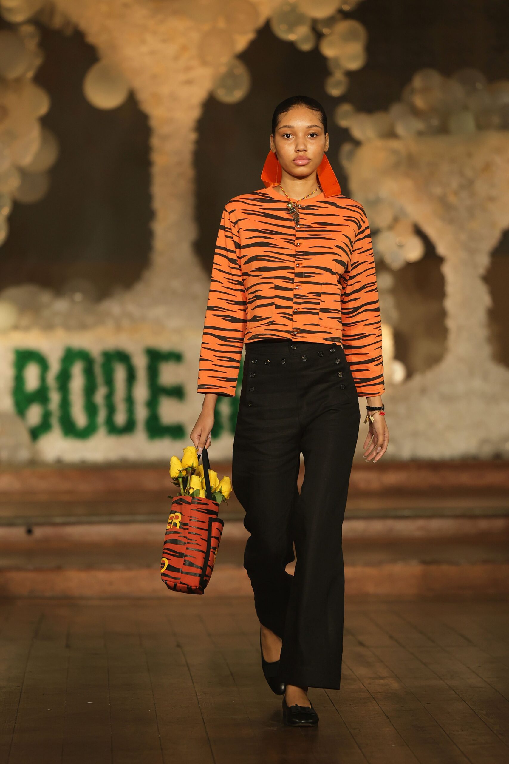 orange long-sleeve collared fitted animal-print top