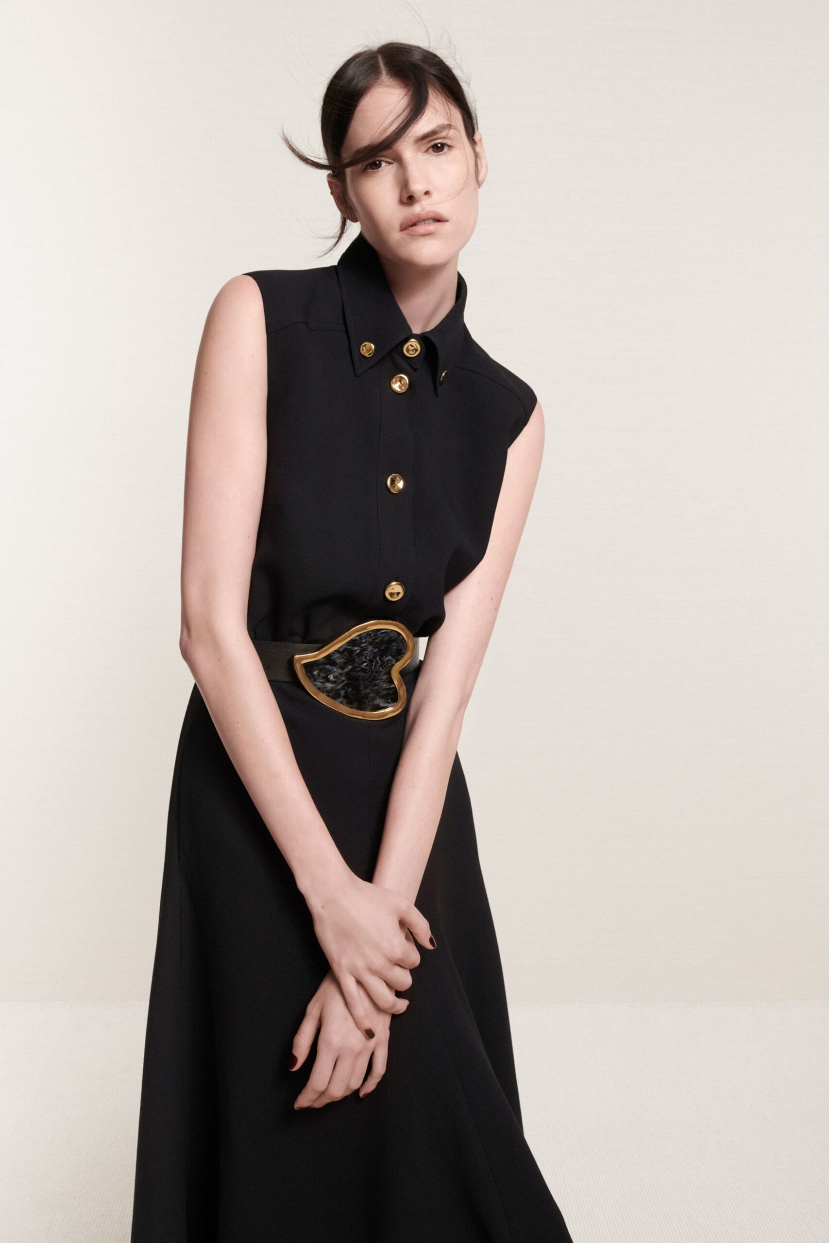 black sleeveless midi dress with belt