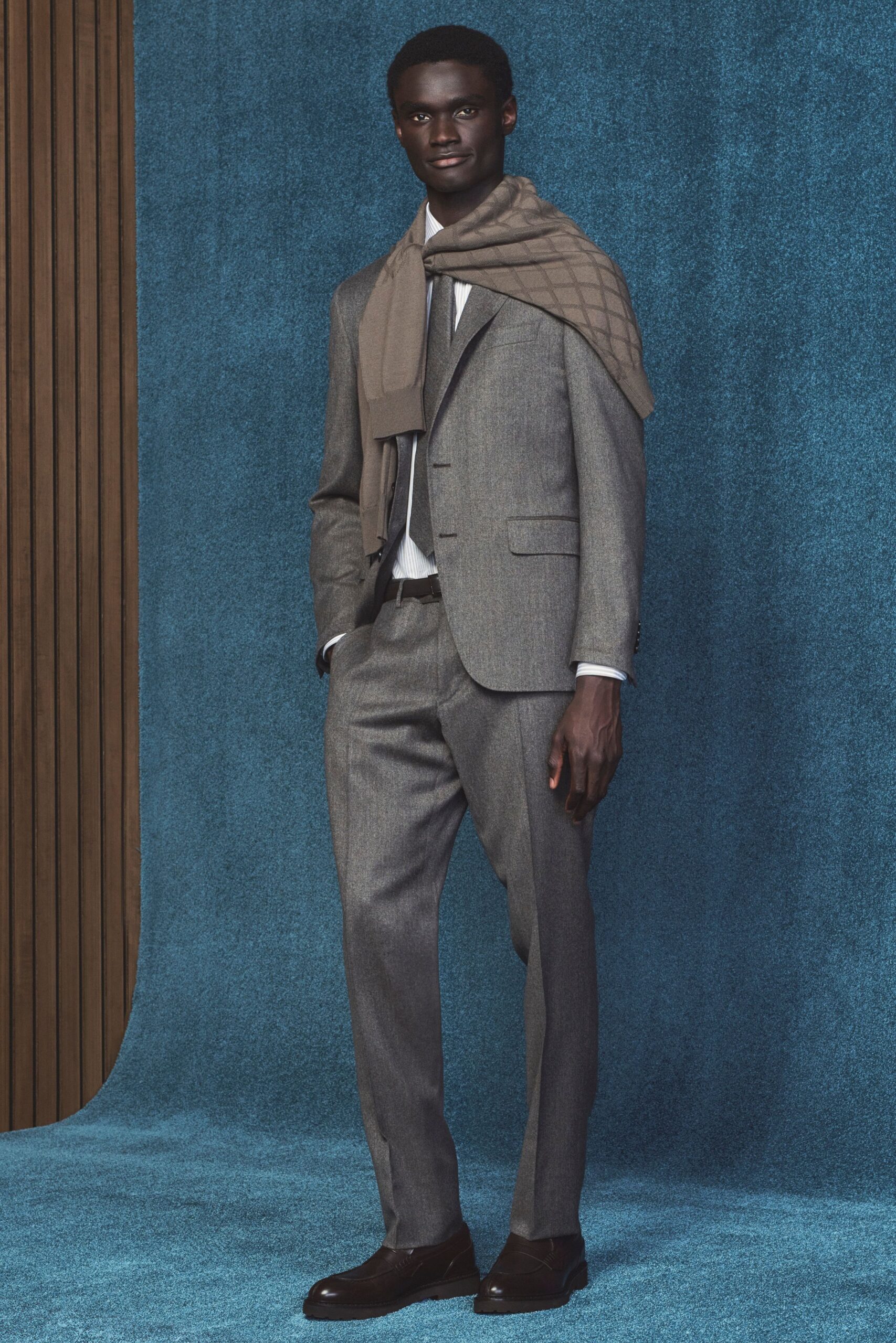 gray tailored suit with scarf