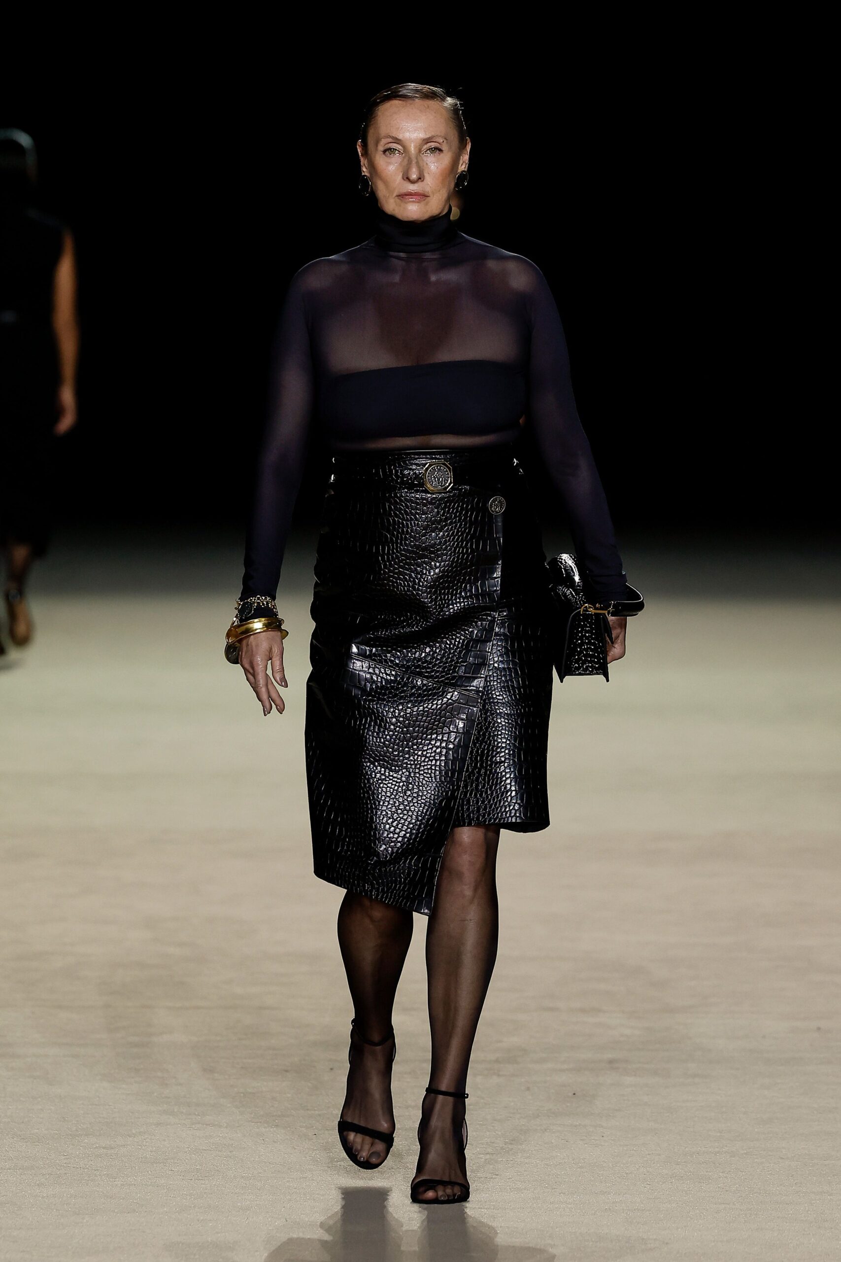 black mesh top and leather skirt