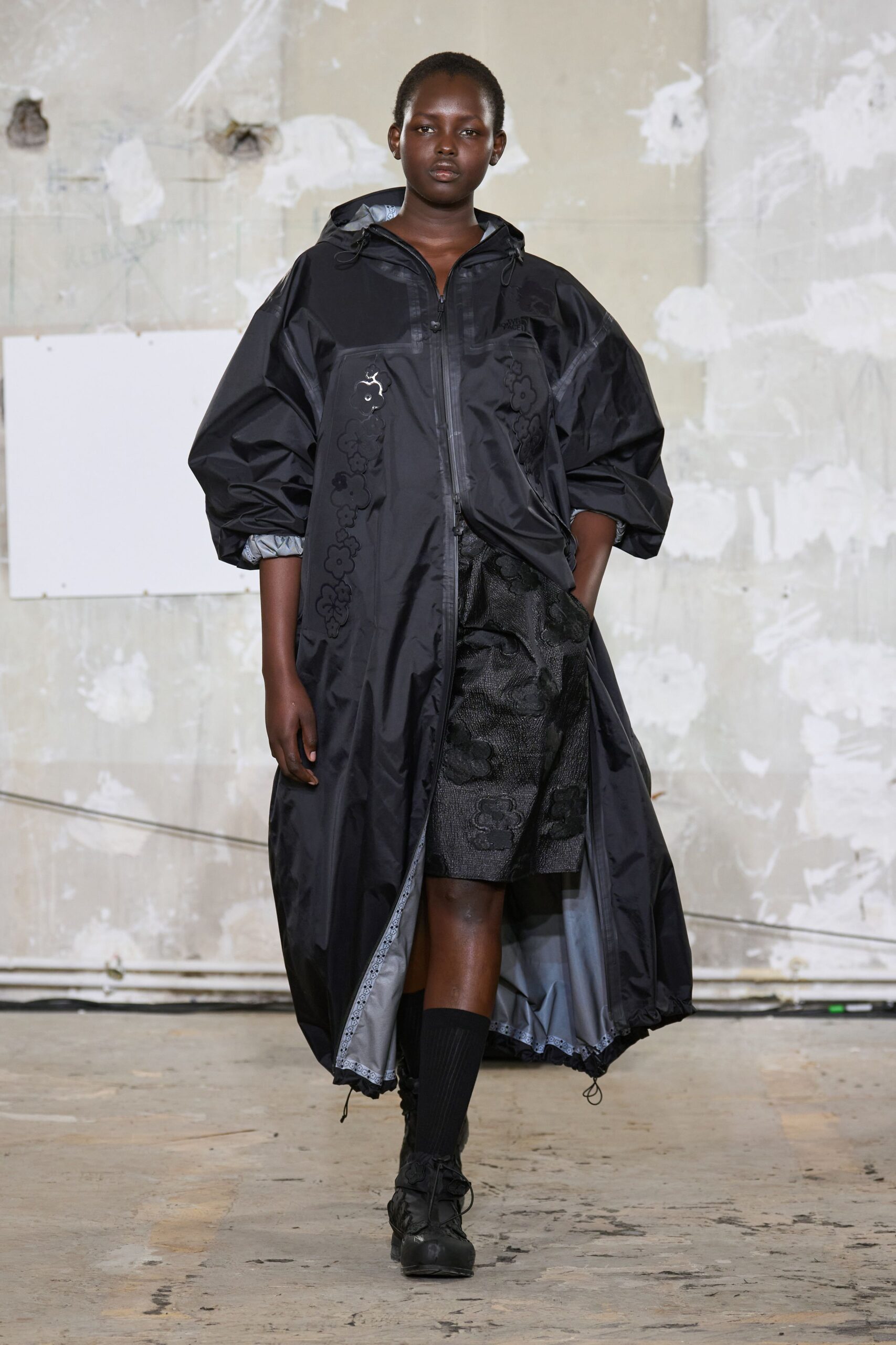 black relaxed coat with shorts