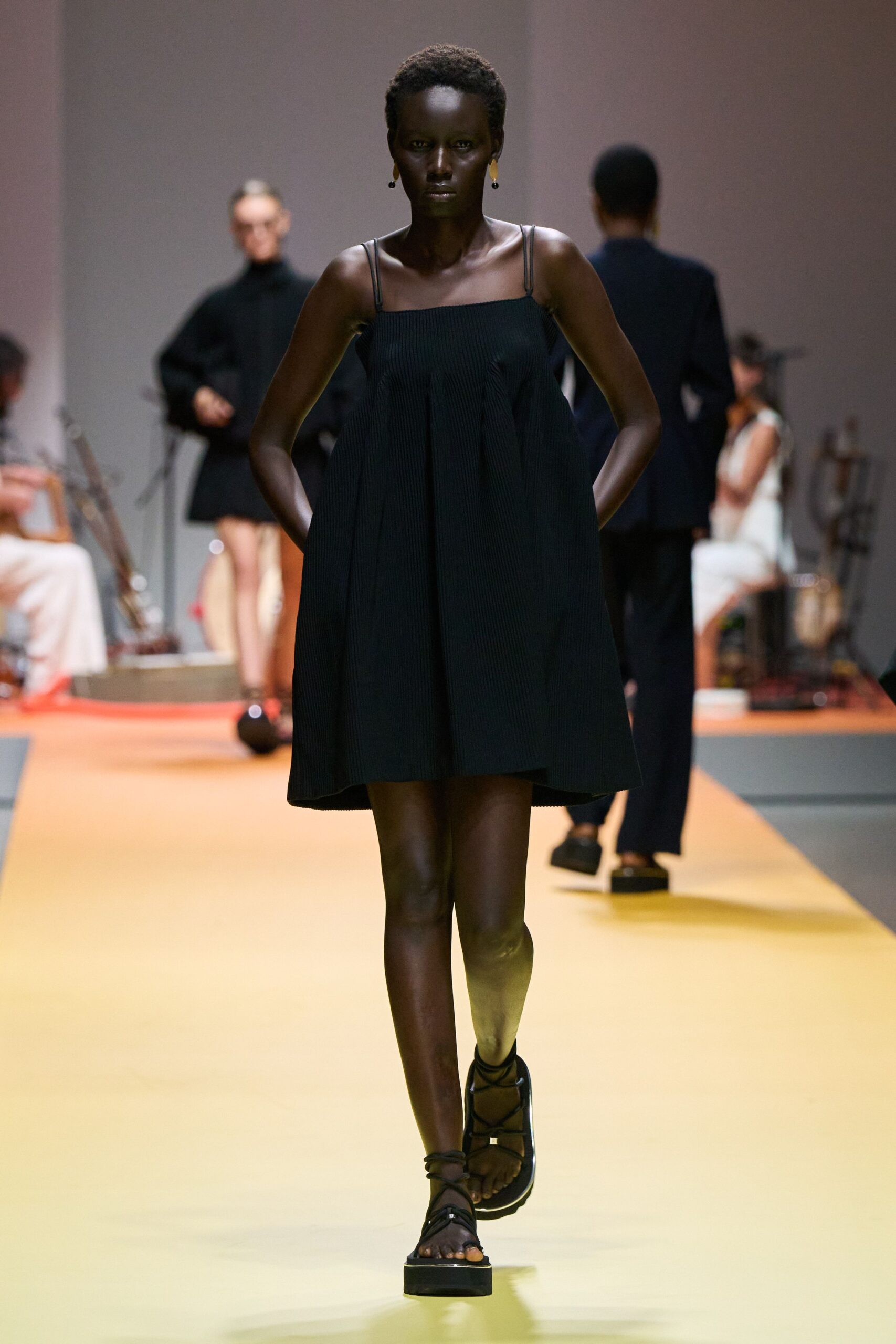 black relaxed mini dress with flat shoes