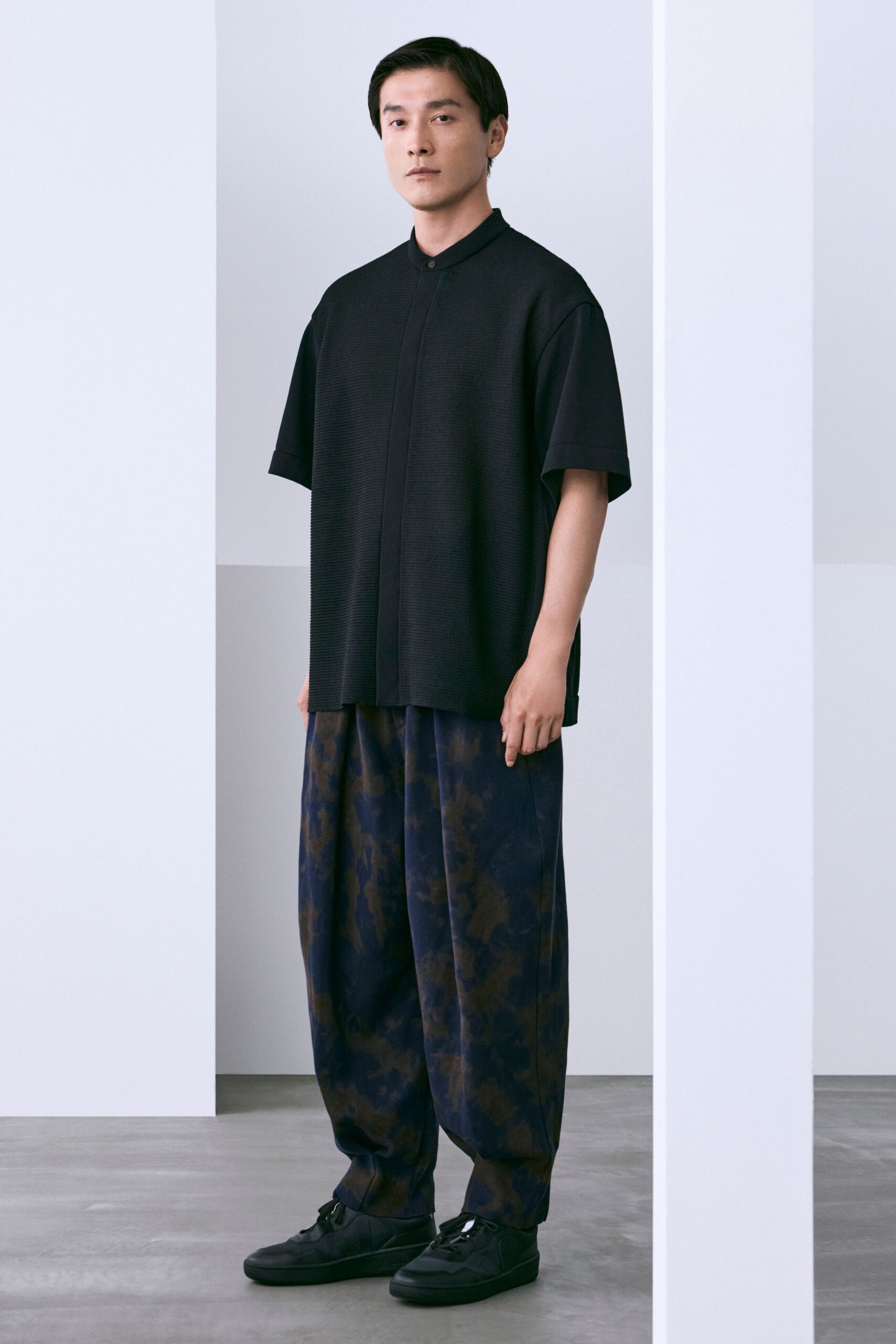 black knit short-sleeve collared oversized buttoned textured shirt