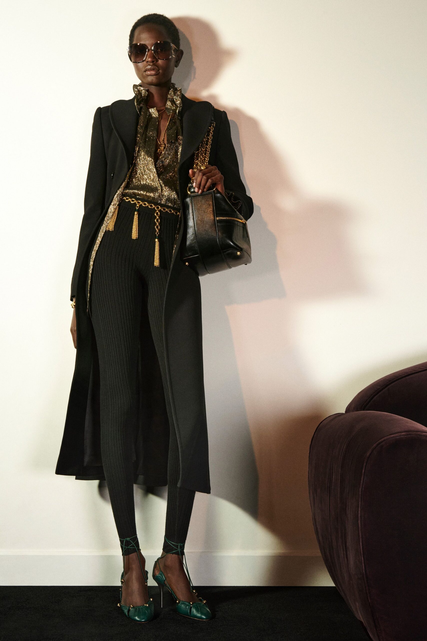 black wool coat with gold top