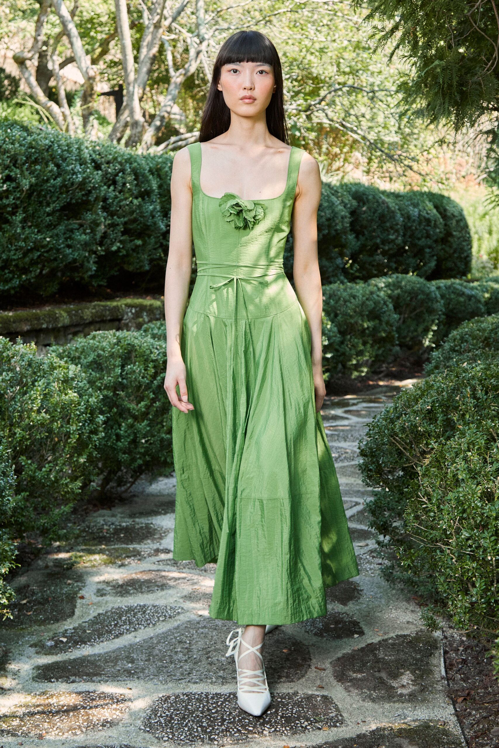 green midi dress with lace-up shoes