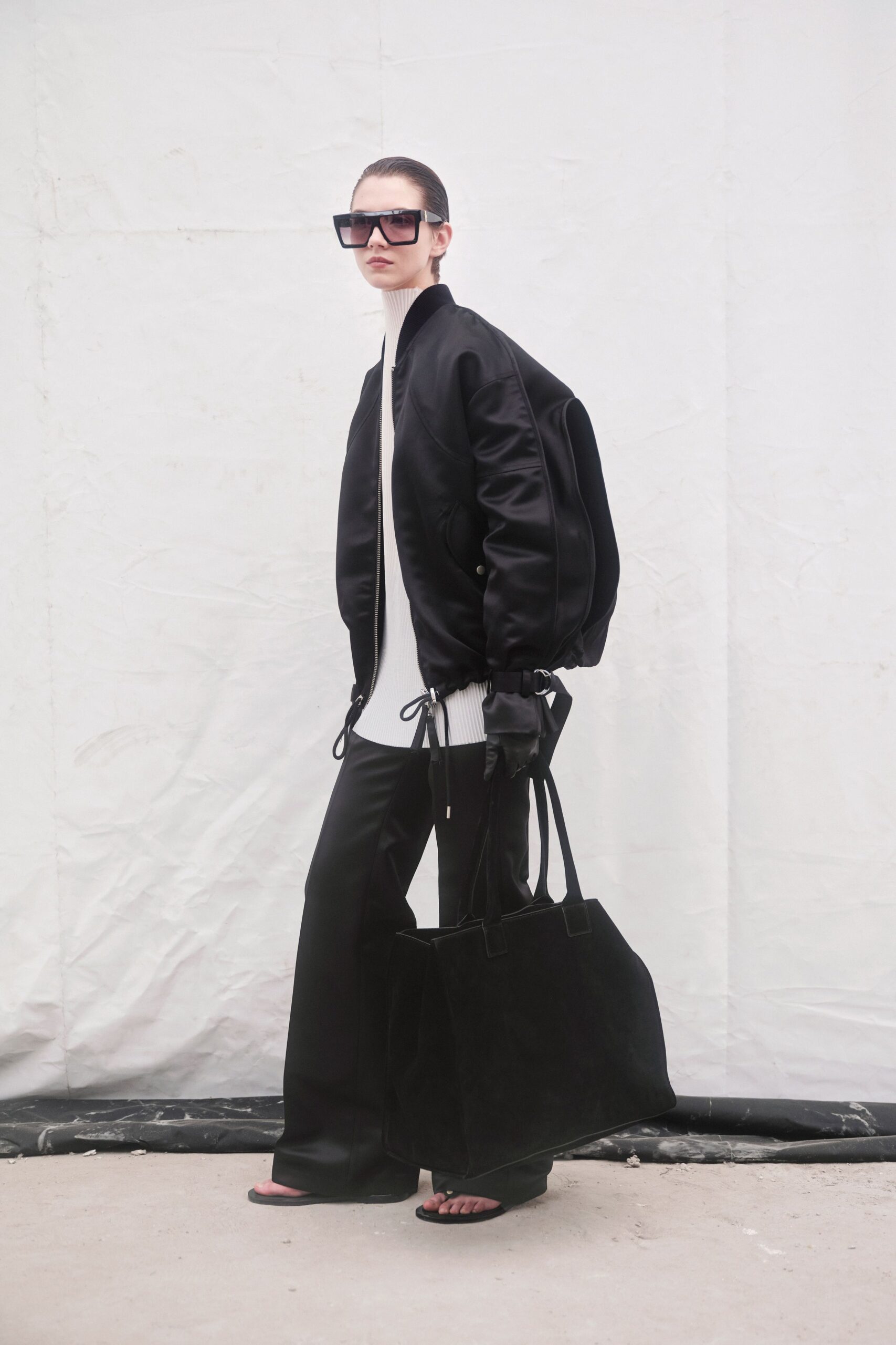 black relaxed jacket with white top