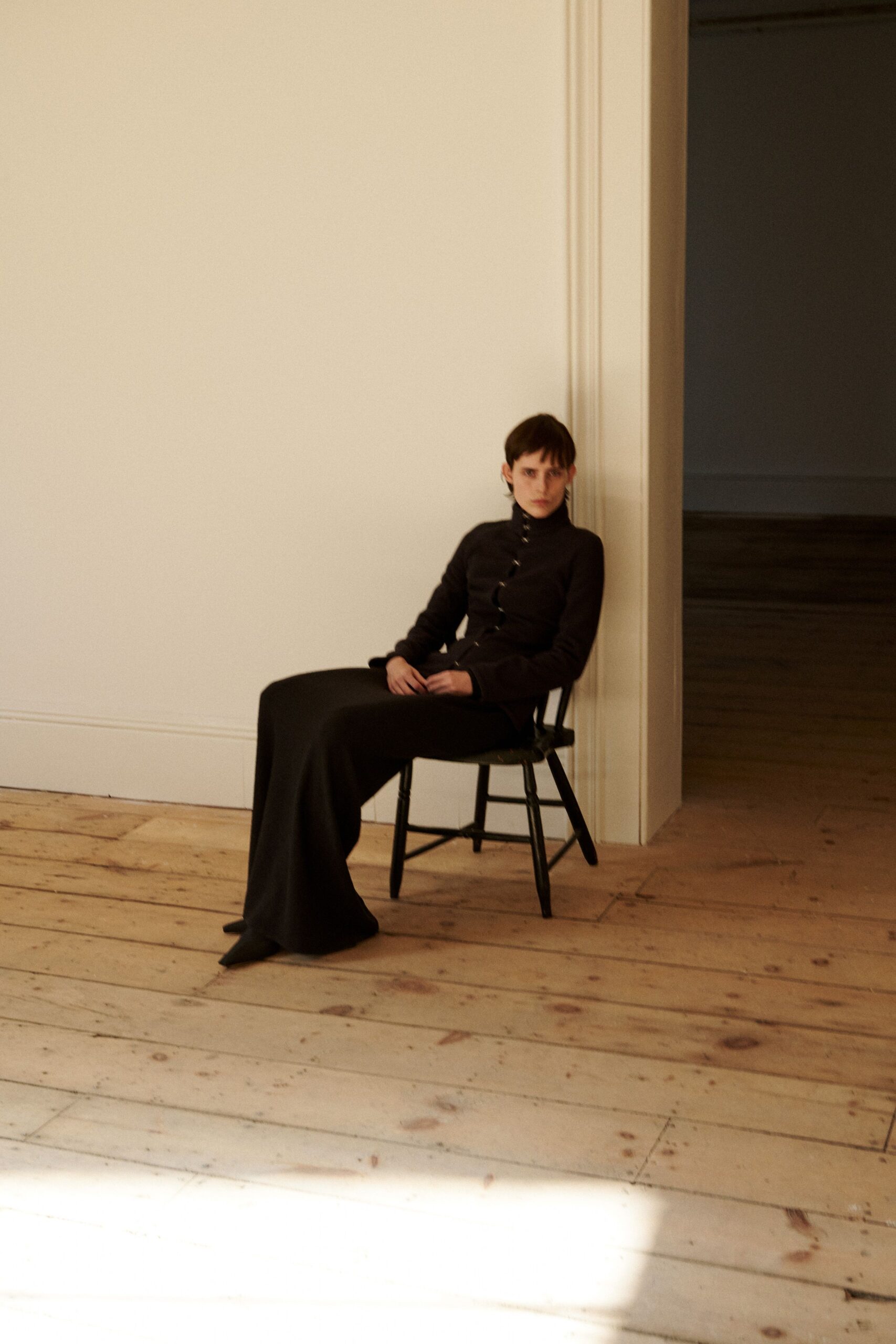black fitted long-sleeve dress