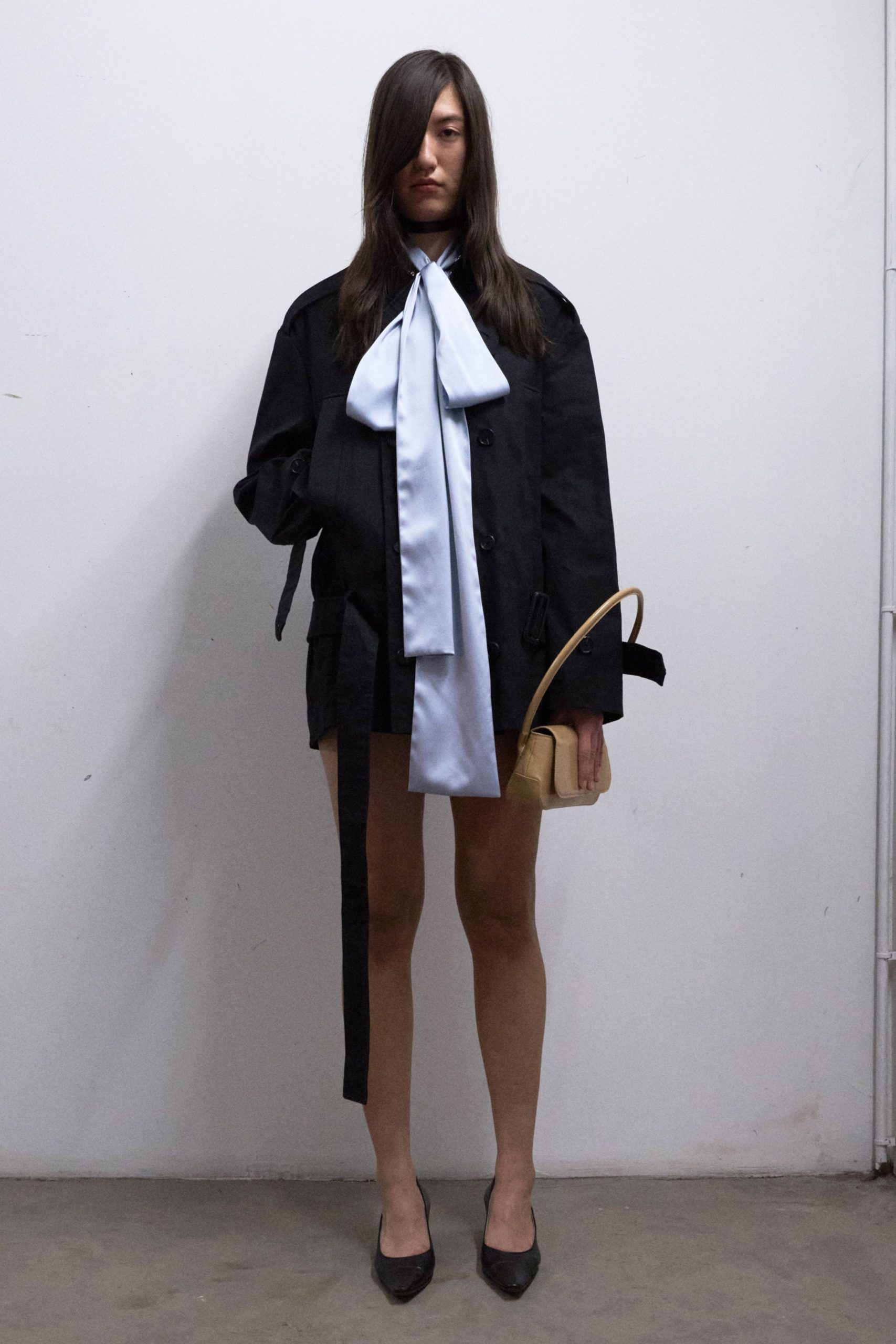 black jacket with blue top
