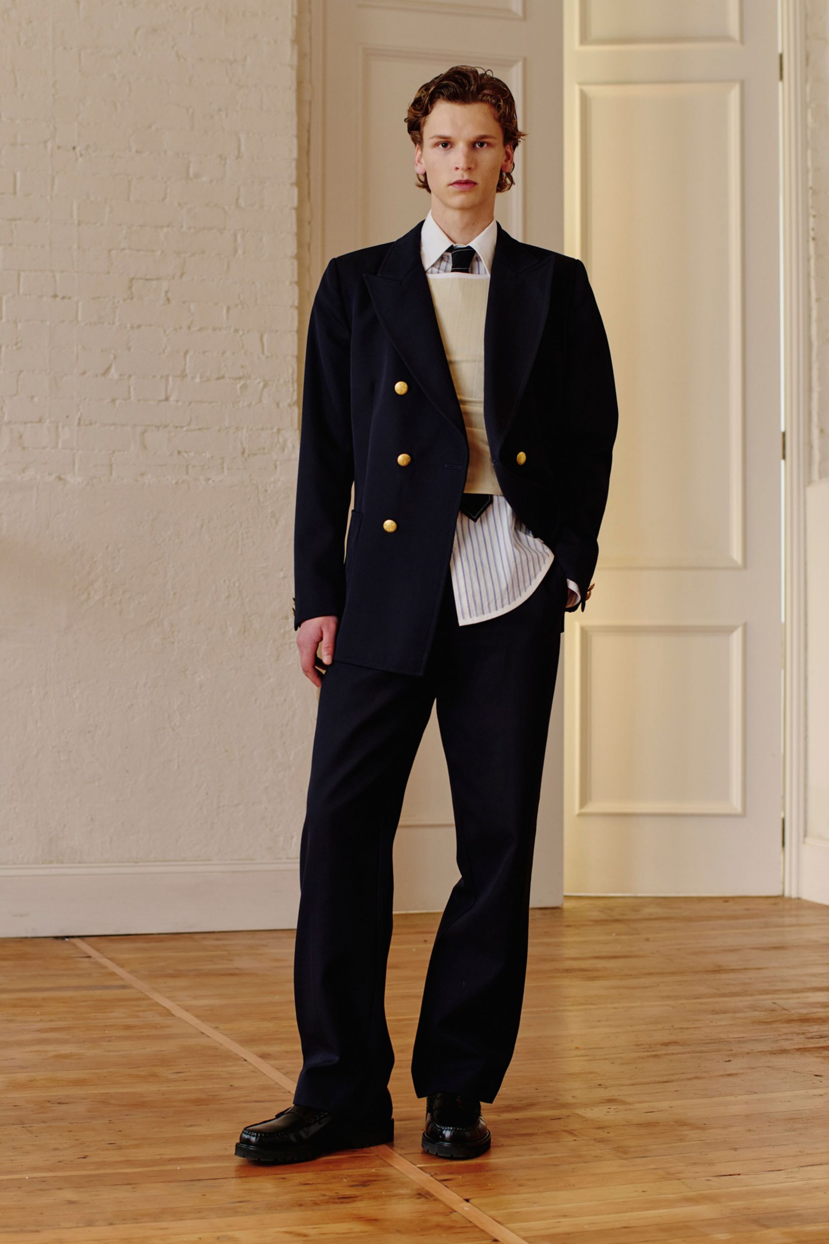 black tailored blazer with shirt and pants