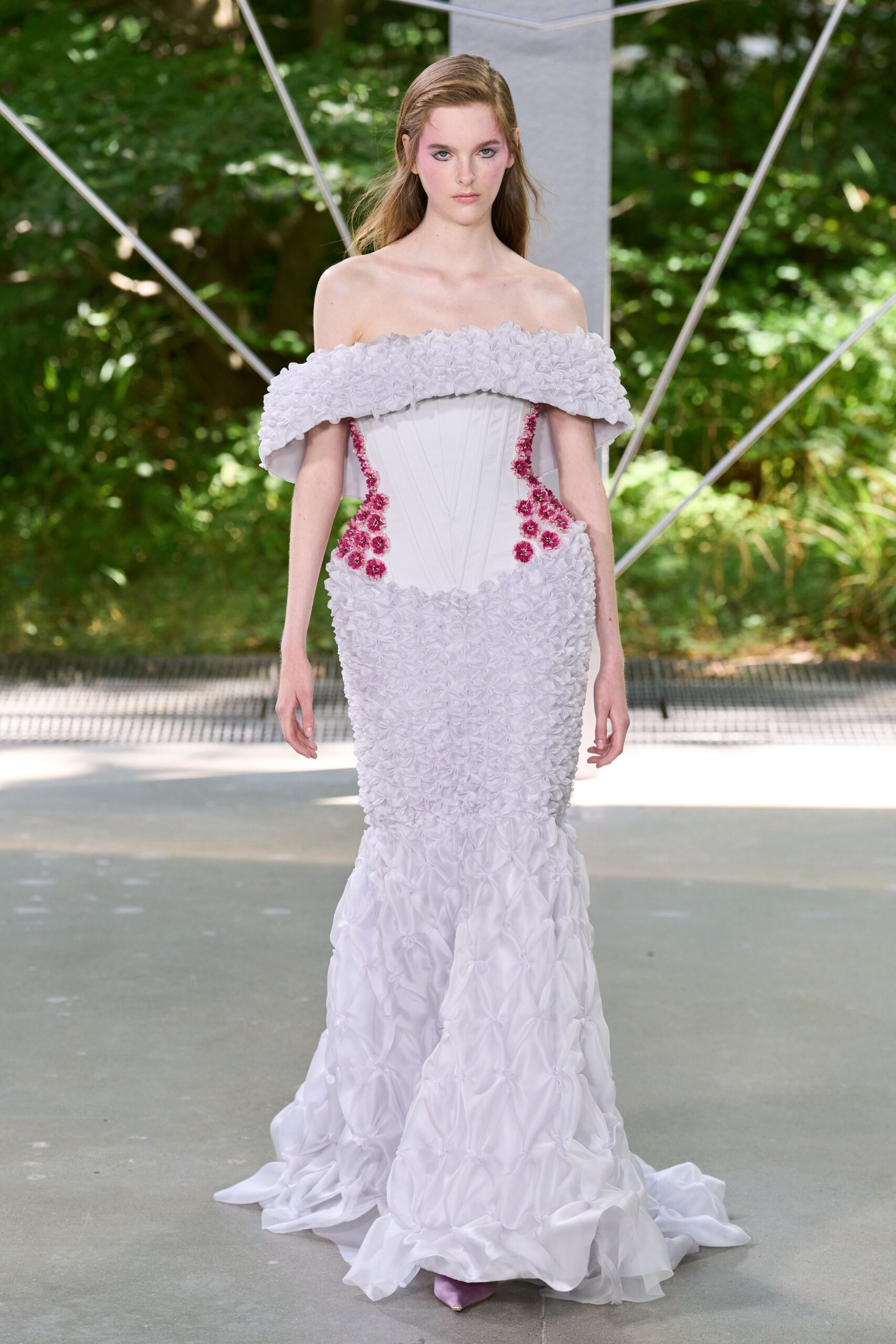 white off-shoulder ruffled gown