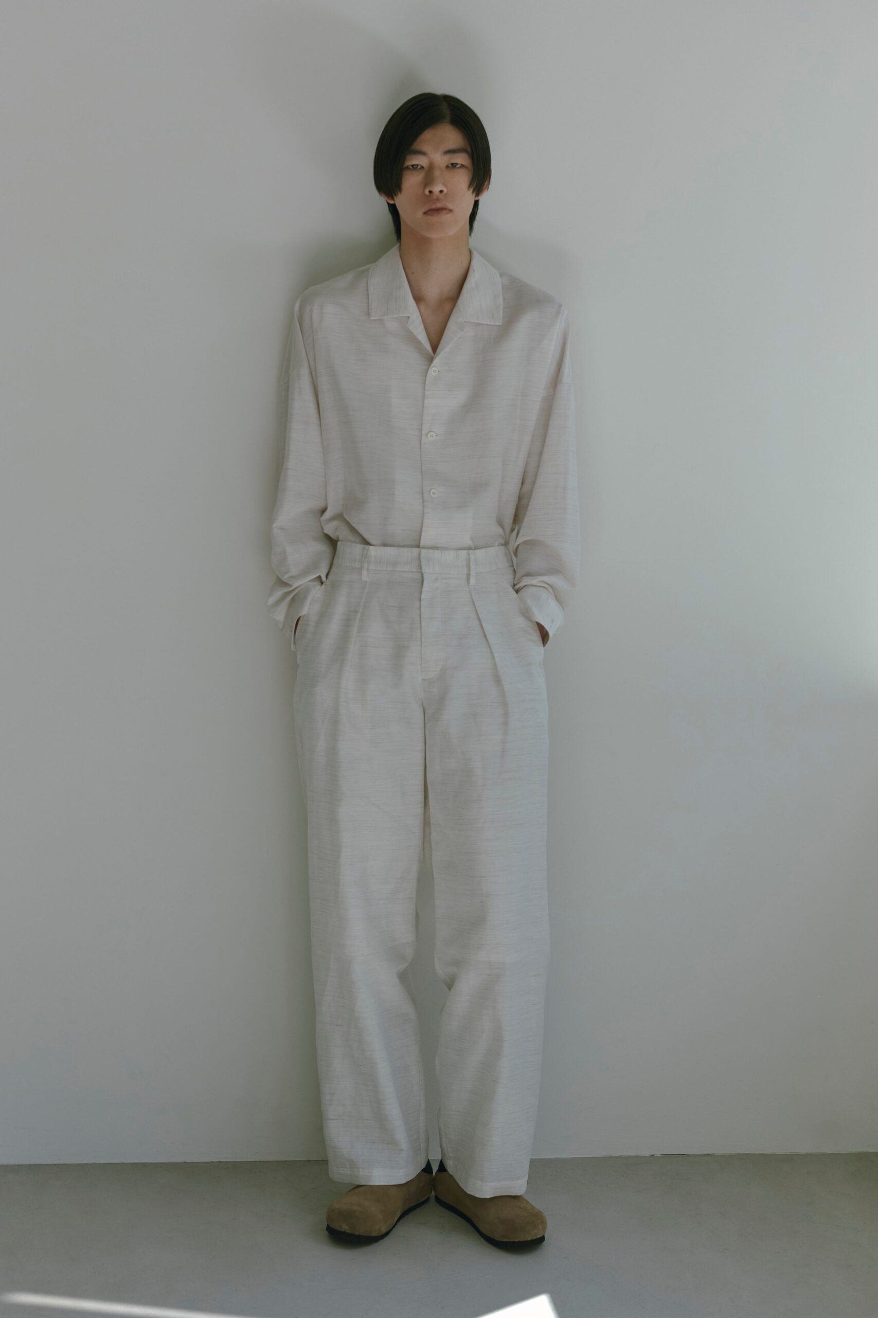 white relaxed shirt and pants